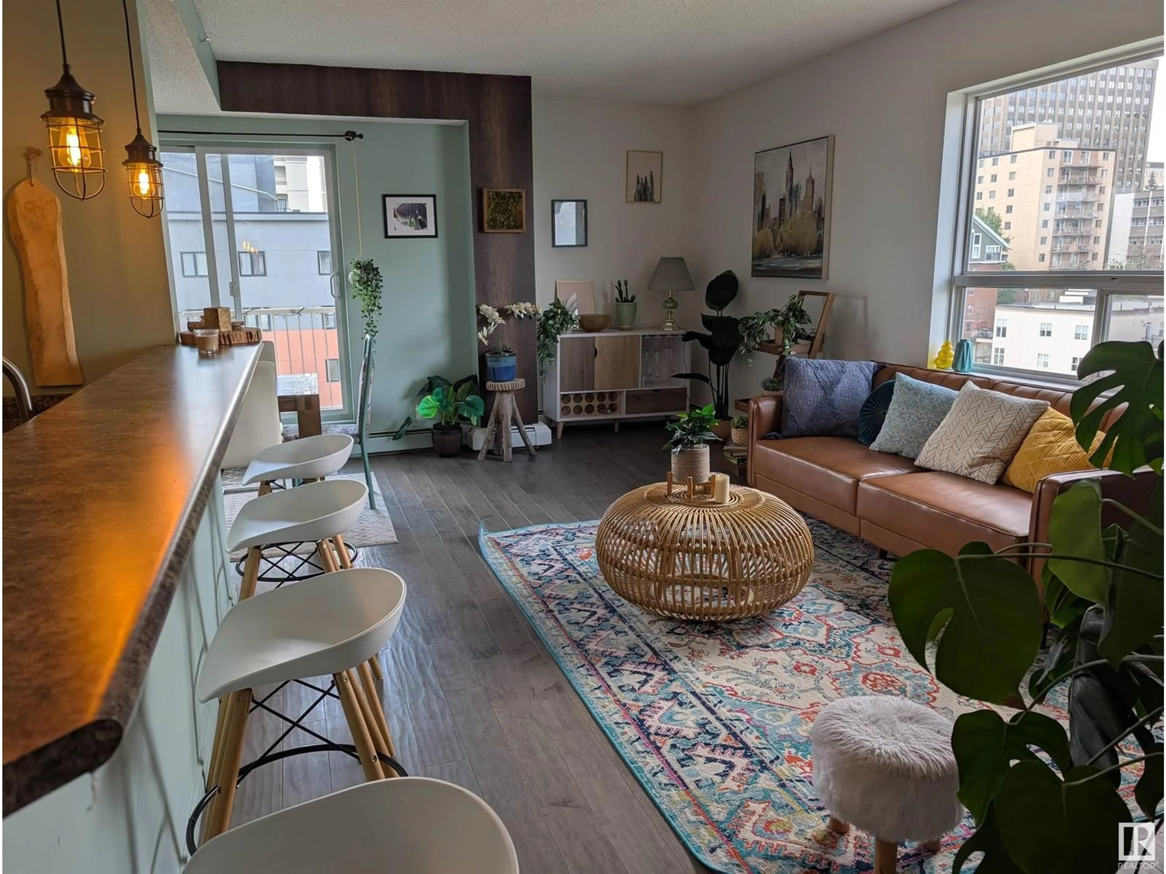 Living room with furniture, wood/laminate floor for 1102 - 9707 105 ST, Edmonton Alberta T5K2Y4