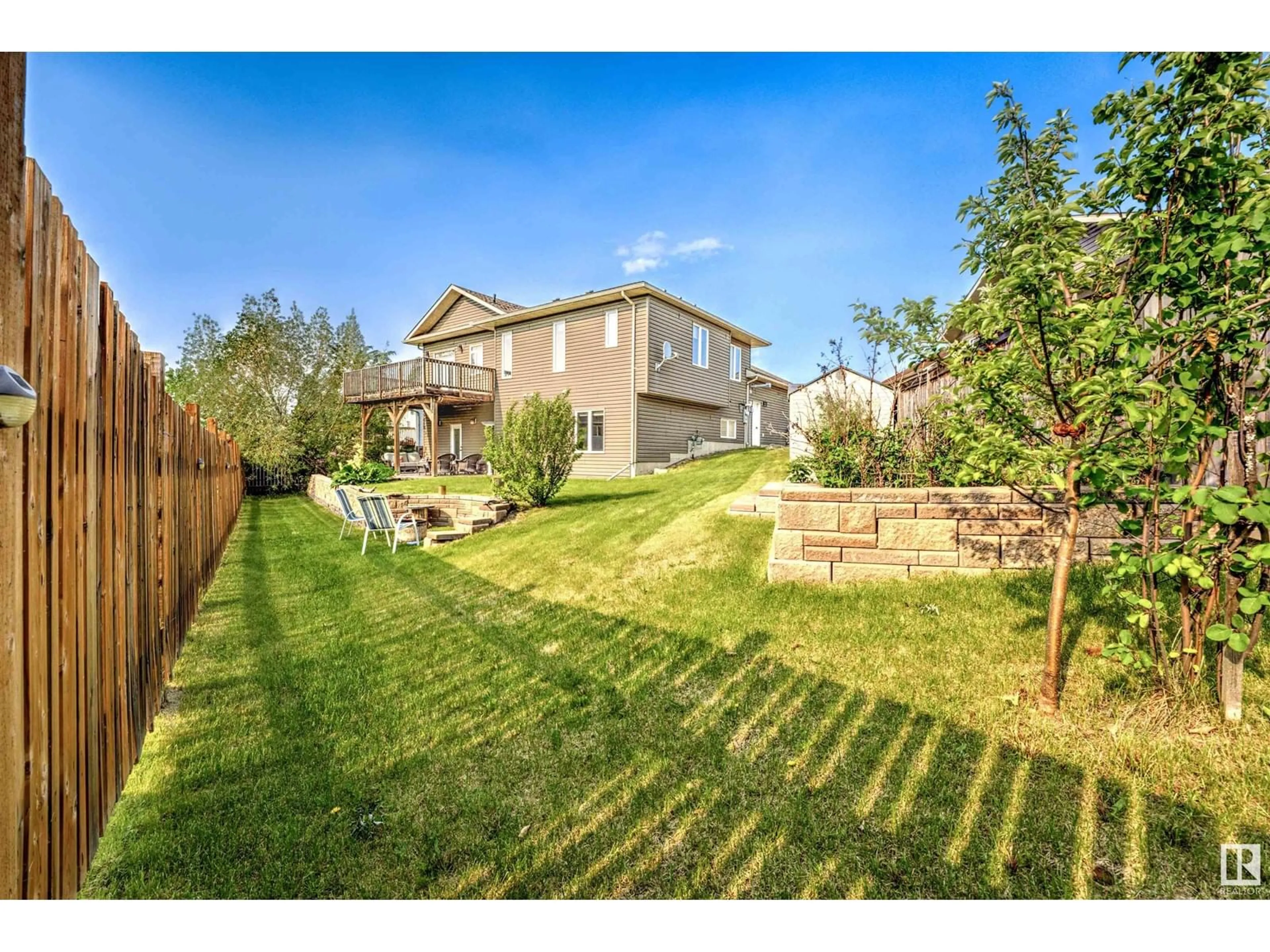 A pic from outside/outdoor area/front of a property/back of a property/a pic from drone, unknown for 707 ROBIN CL, Cold Lake Alberta T9M2B7