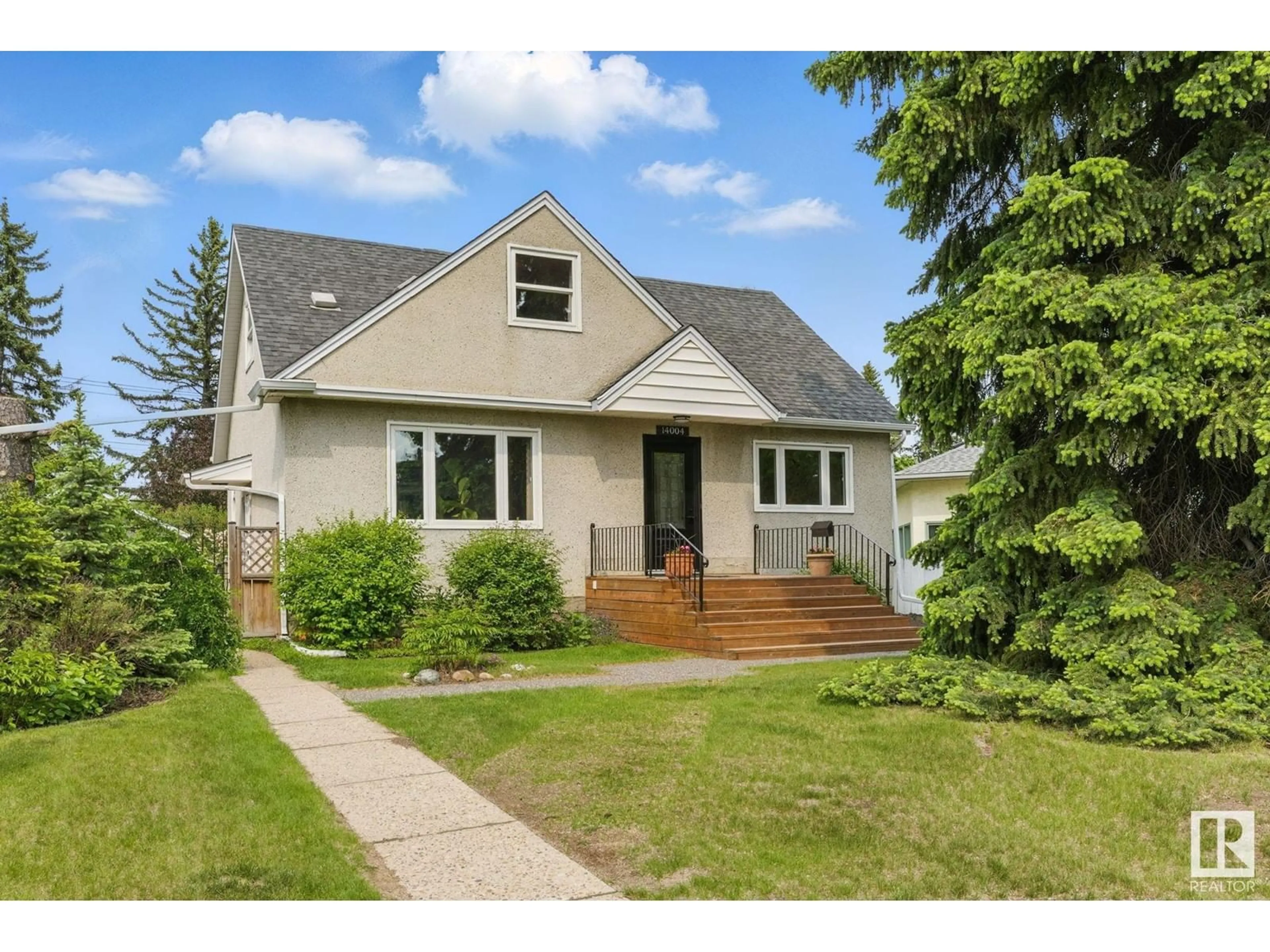 Home with vinyl exterior material, street for 14004 106A AV, Edmonton Alberta T5N1E1