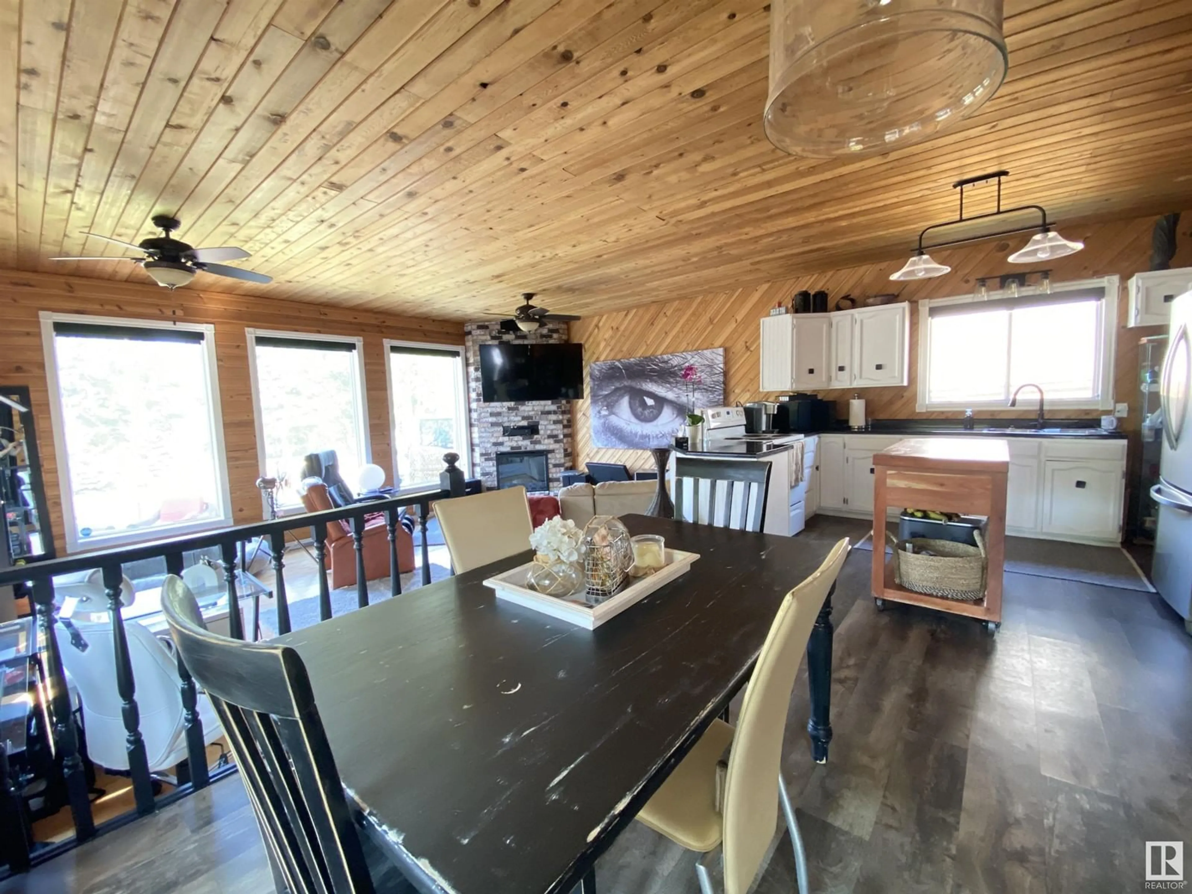 Open concept kitchen, wood/laminate floor for 213 CRYSTAL SPRINGS DR, Rural Wetaskiwin County Alberta T0C2V0