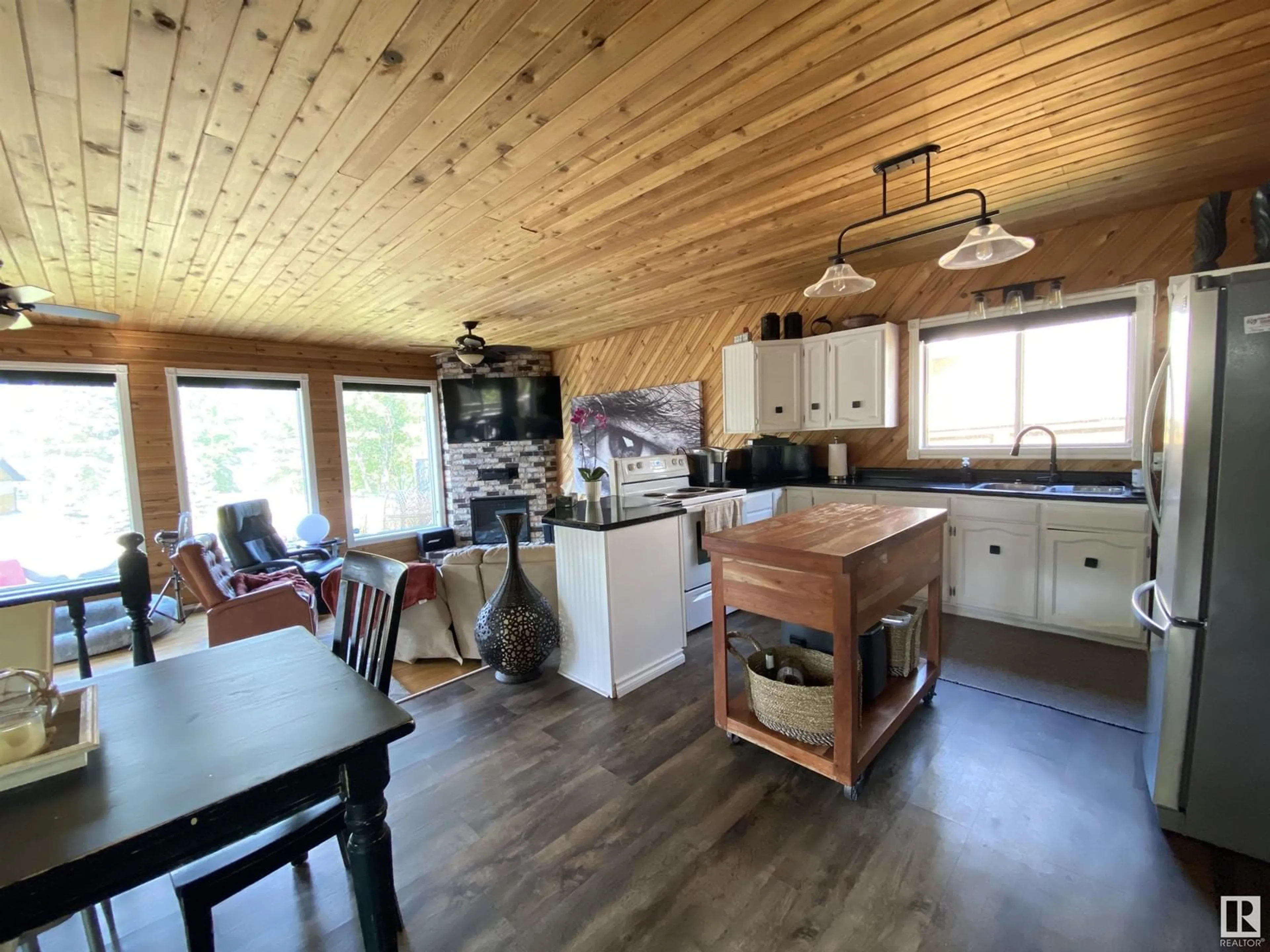 Open concept kitchen, wood/laminate floor for 213 CRYSTAL SPRINGS DR, Rural Wetaskiwin County Alberta T0C2V0