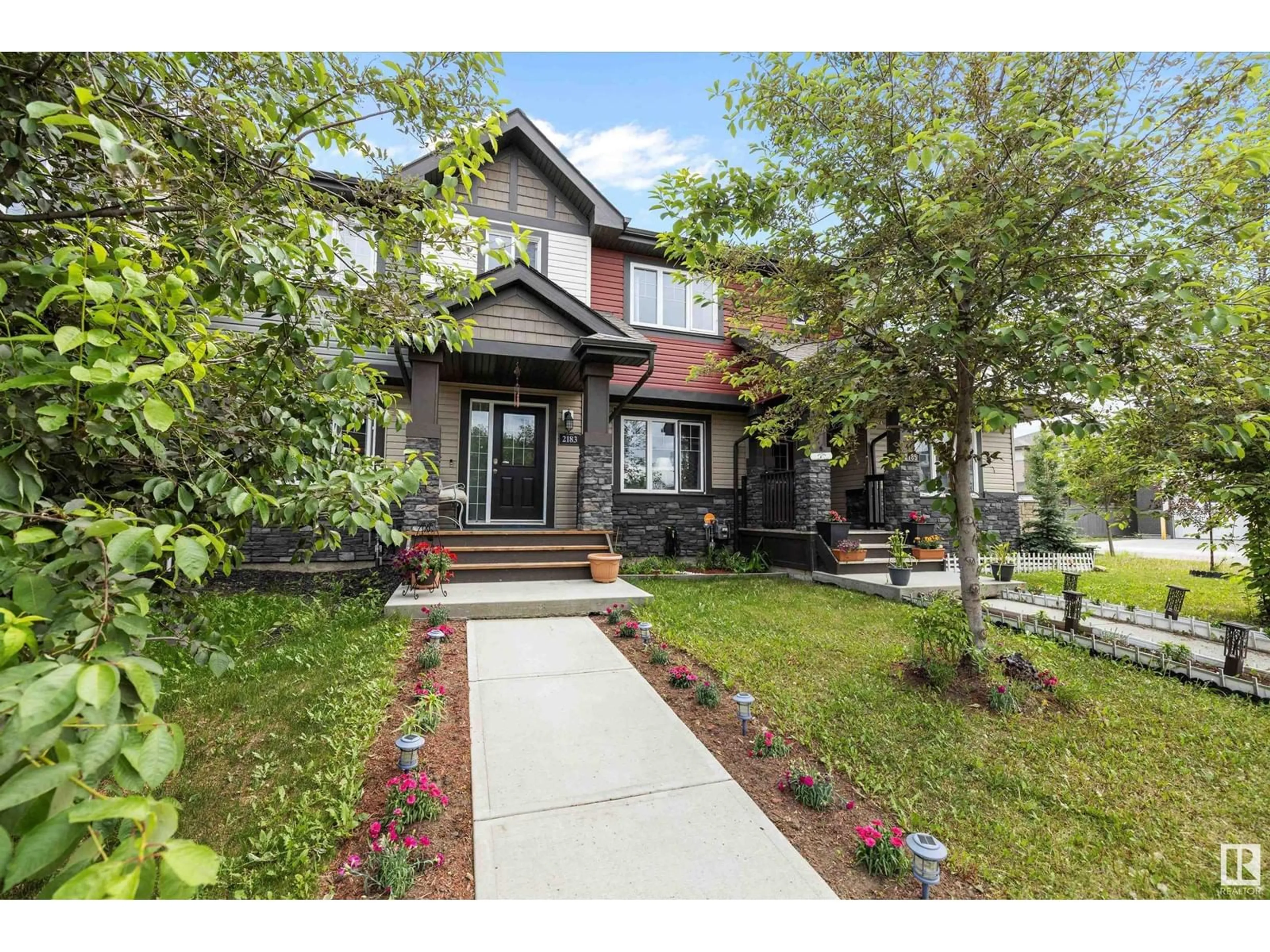 Home with brick exterior material, street for 2183 TRUMPETER WY, Edmonton Alberta T5S0K2