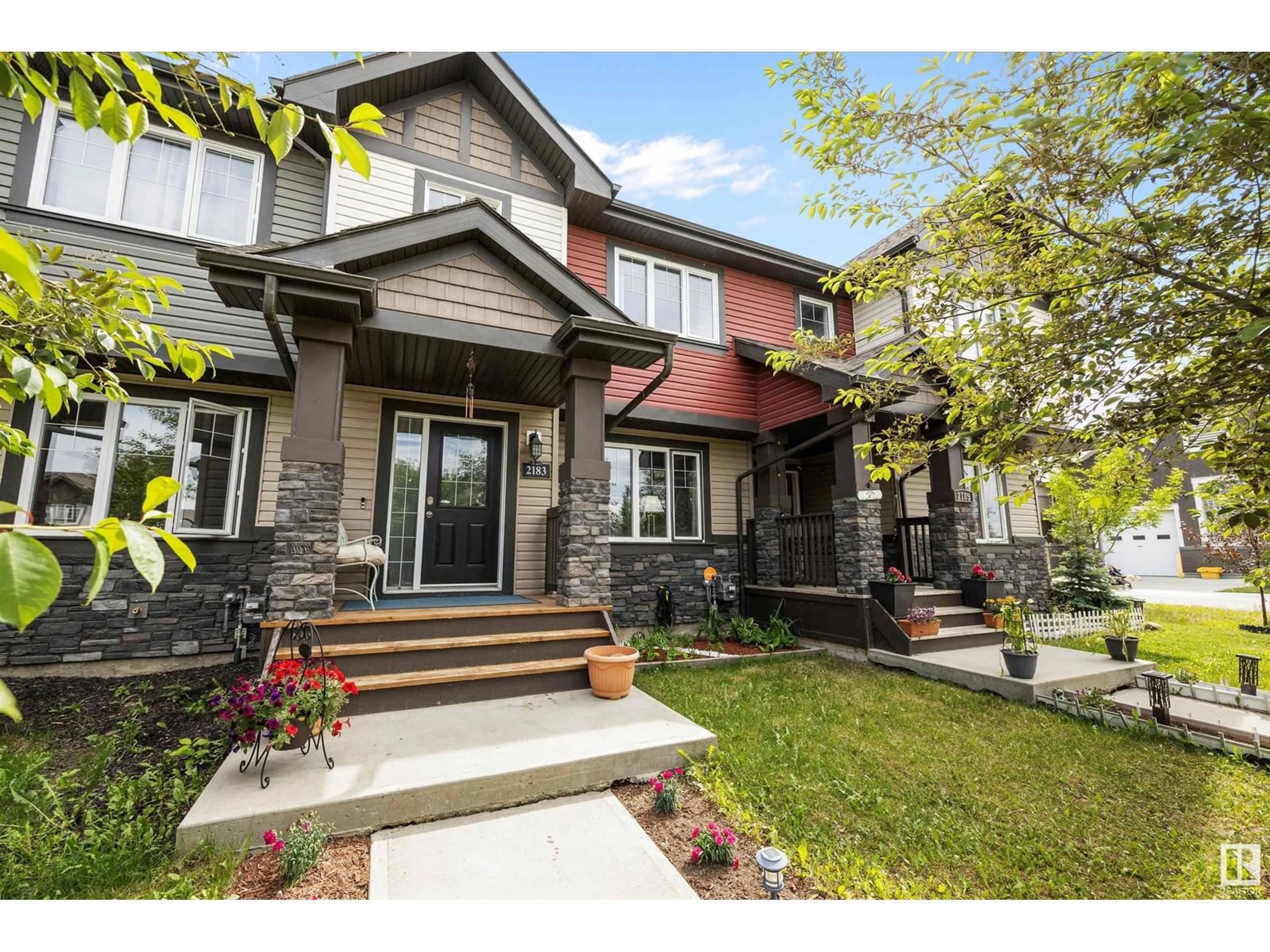 Home with brick exterior material, street for 2183 TRUMPETER WY, Edmonton Alberta T5S0K2
