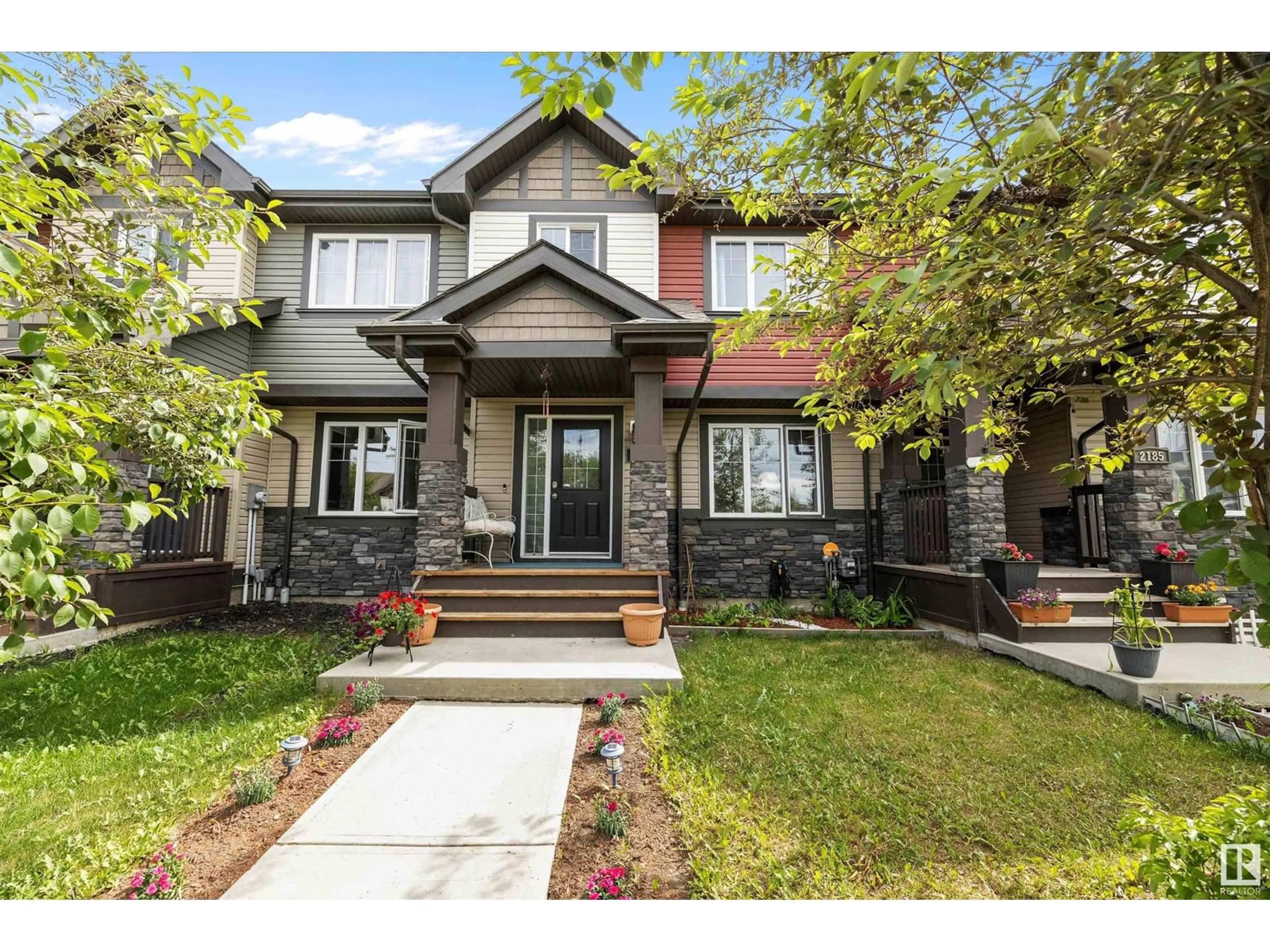 Home with brick exterior material, street for 2183 TRUMPETER WY, Edmonton Alberta T5S0K2