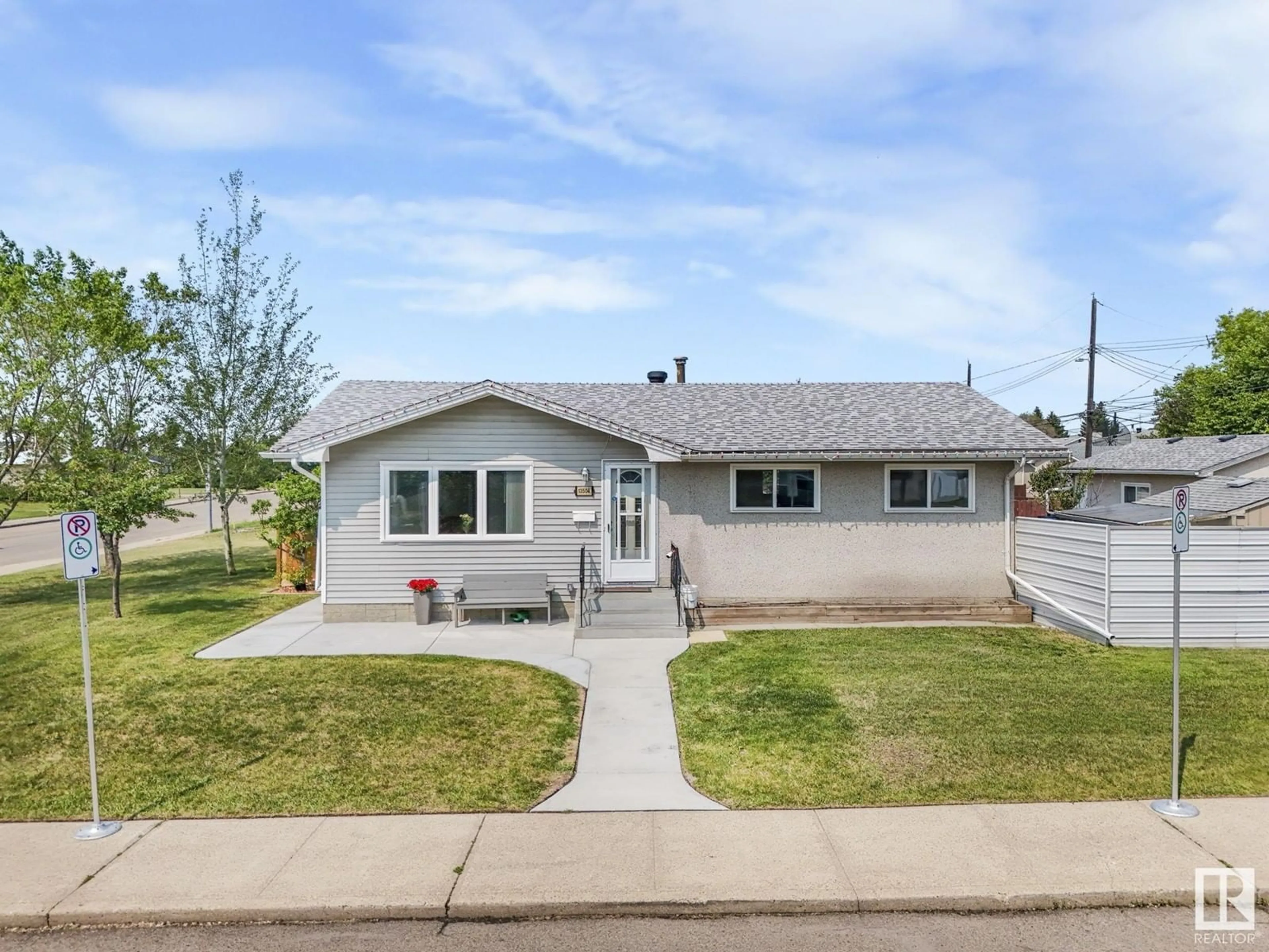 Home with vinyl exterior material, street for 13504 70 ST, Edmonton Alberta T5C0K6