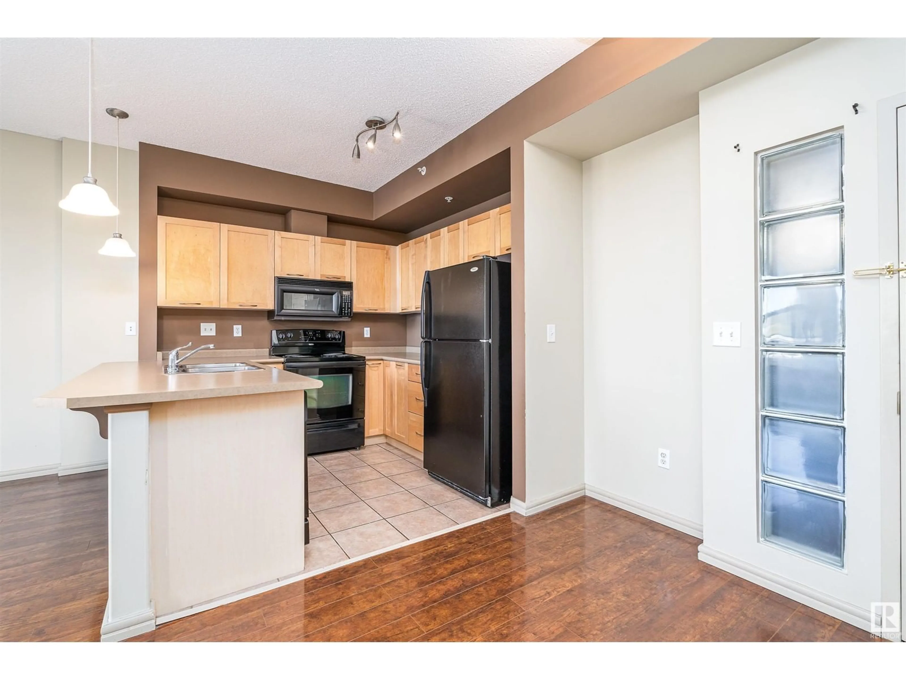 Standard kitchen, wood/laminate floor for 1-309 - 4245 139 AV, Edmonton Alberta T5Y3E8