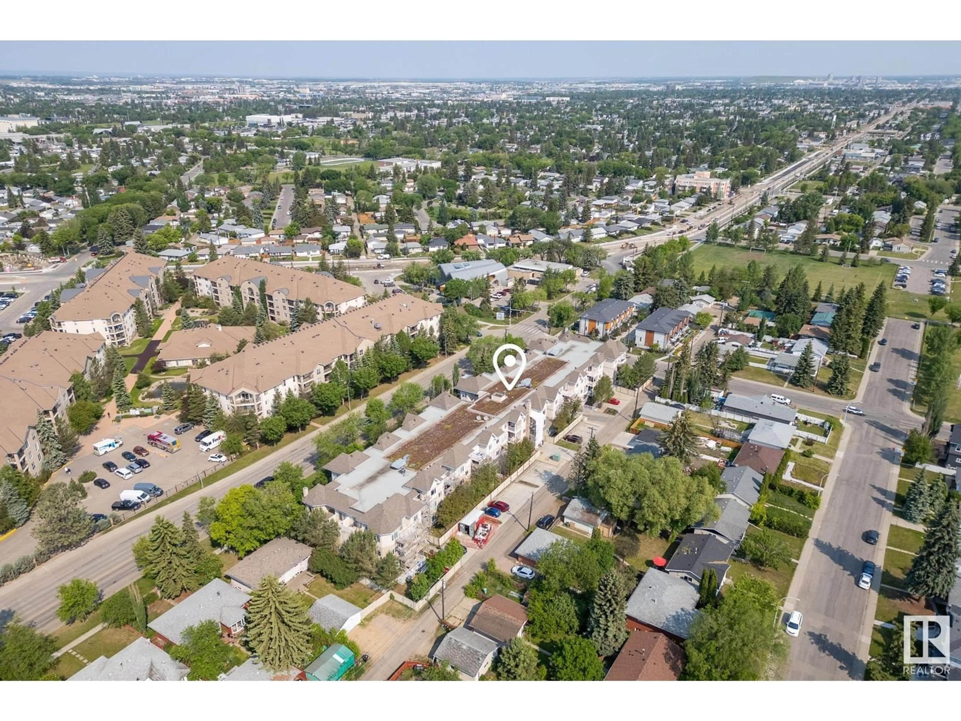 A pic from outside/outdoor area/front of a property/back of a property/a pic from drone, street for #317 - 8931 156 ST, Edmonton Alberta T5R1Y6