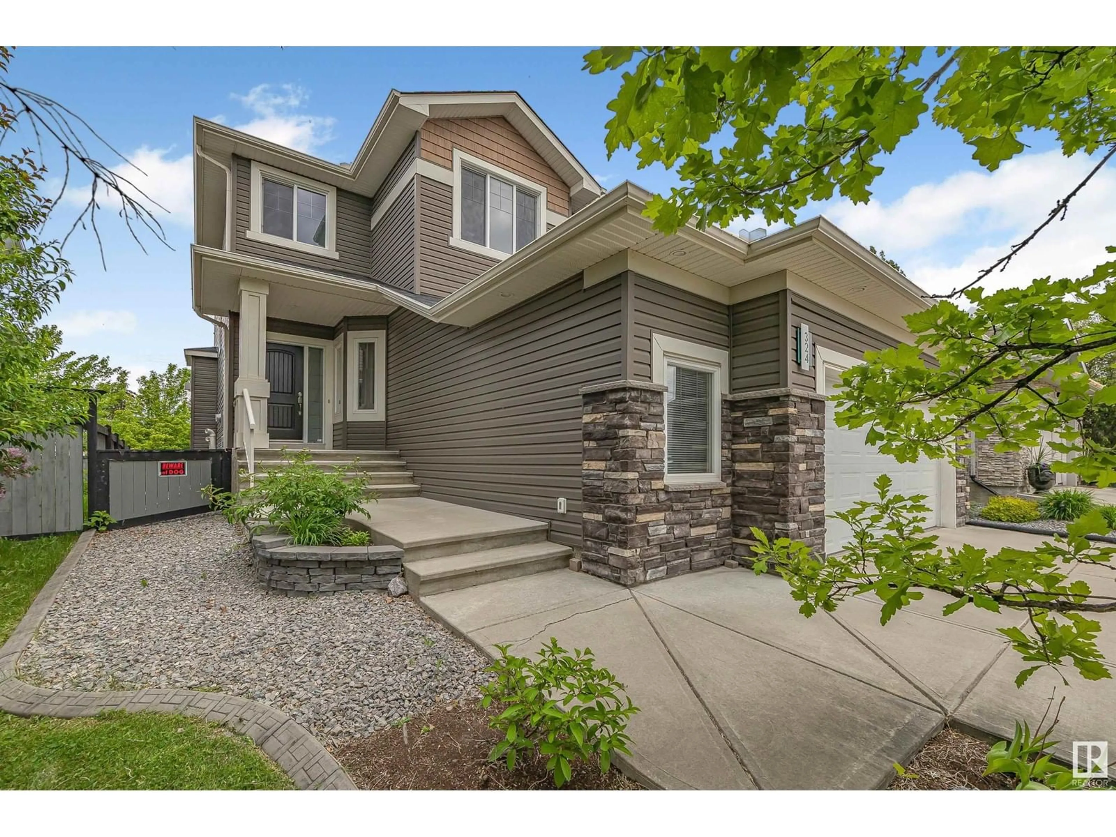 Home with vinyl exterior material, street for 324 BRIDGEPORT PL, Leduc Alberta T9E0M2