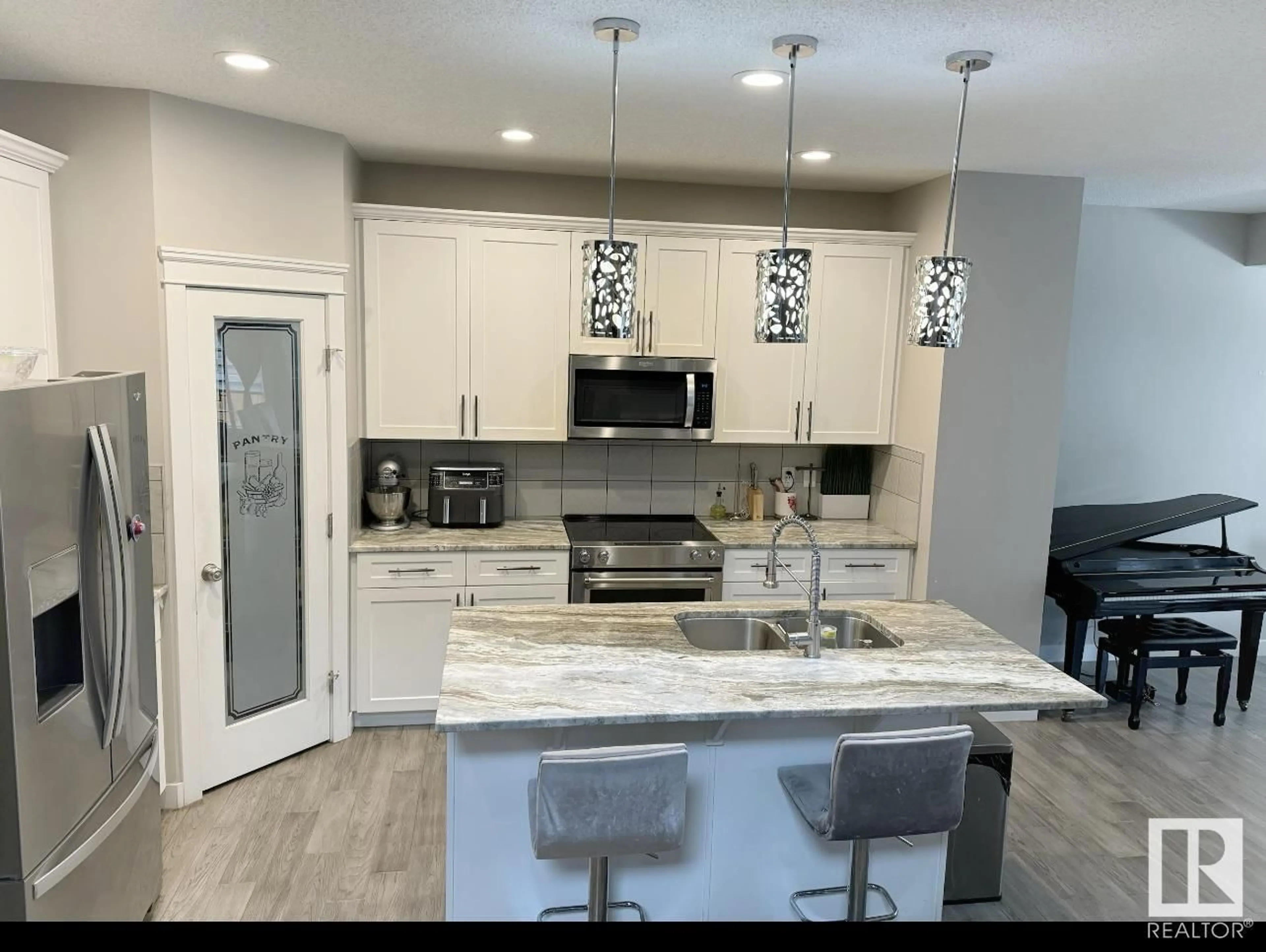 Open concept kitchen, ceramic/tile floor for 9663 224 ST, Edmonton Alberta T5T7K6