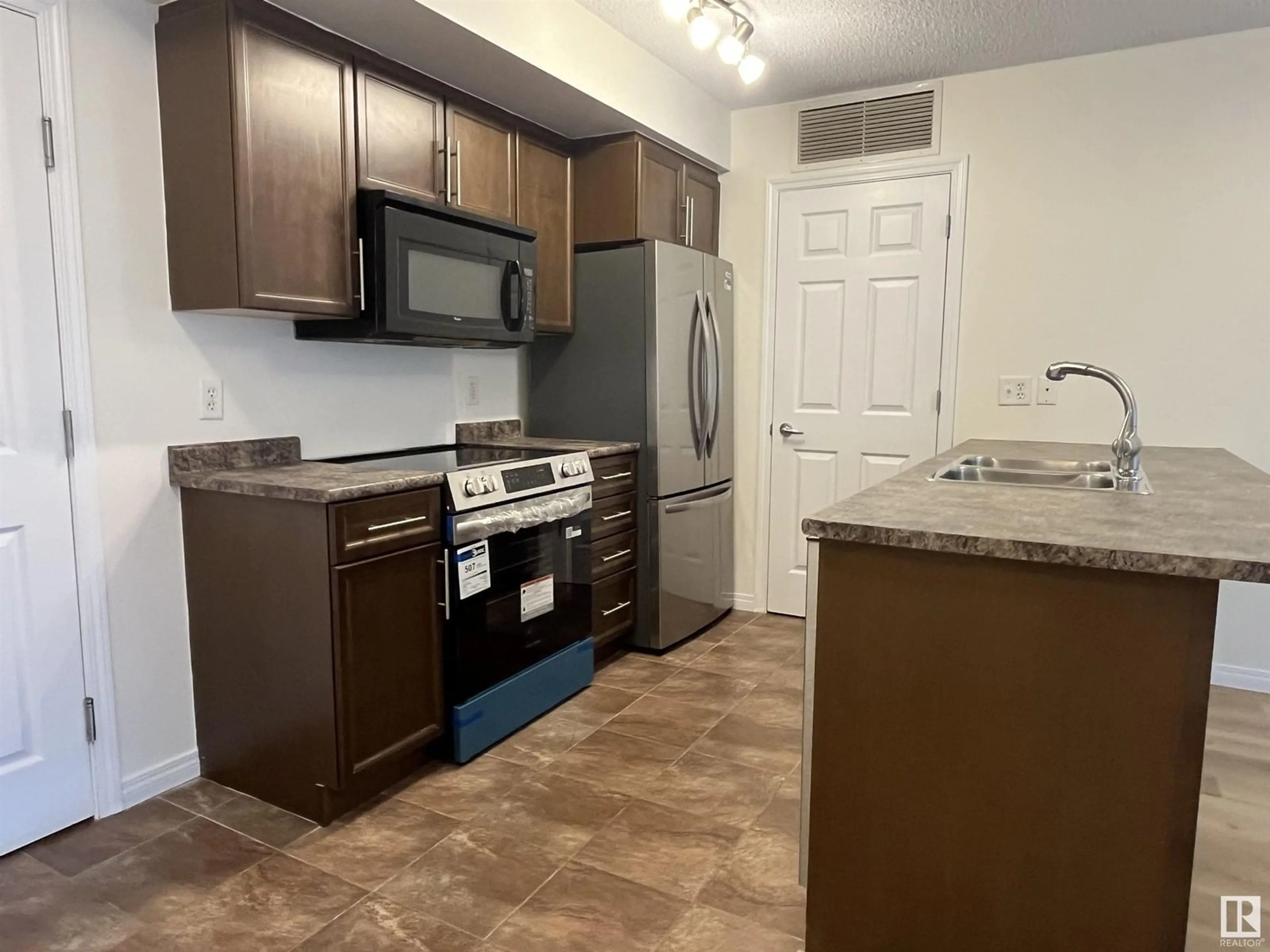 Standard kitchen, unknown for #103 - 6925 199 ST, Edmonton Alberta T5T3X8