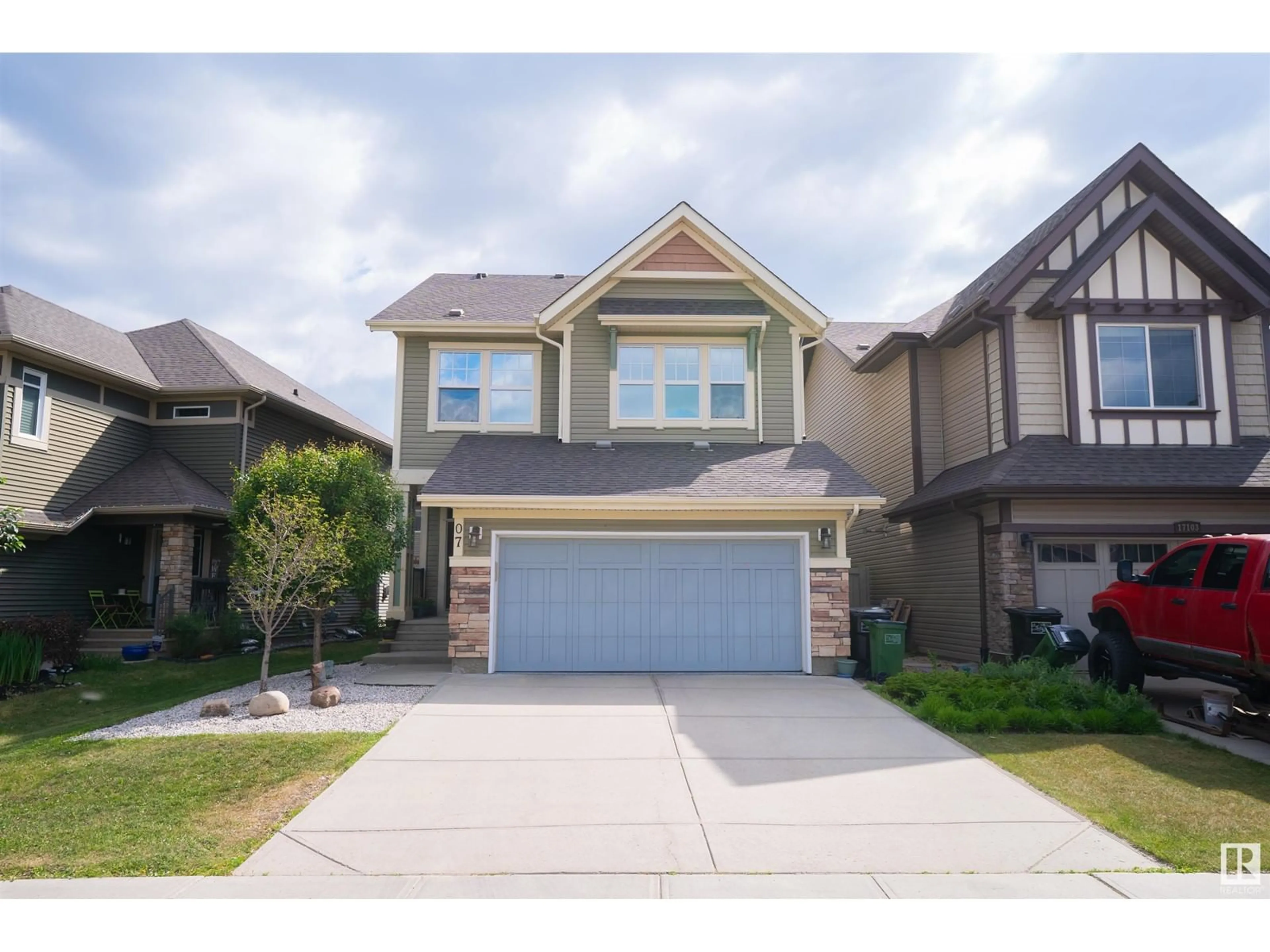 Home with vinyl exterior material, street for 17107 71 ST, Edmonton Alberta T5T3W7
