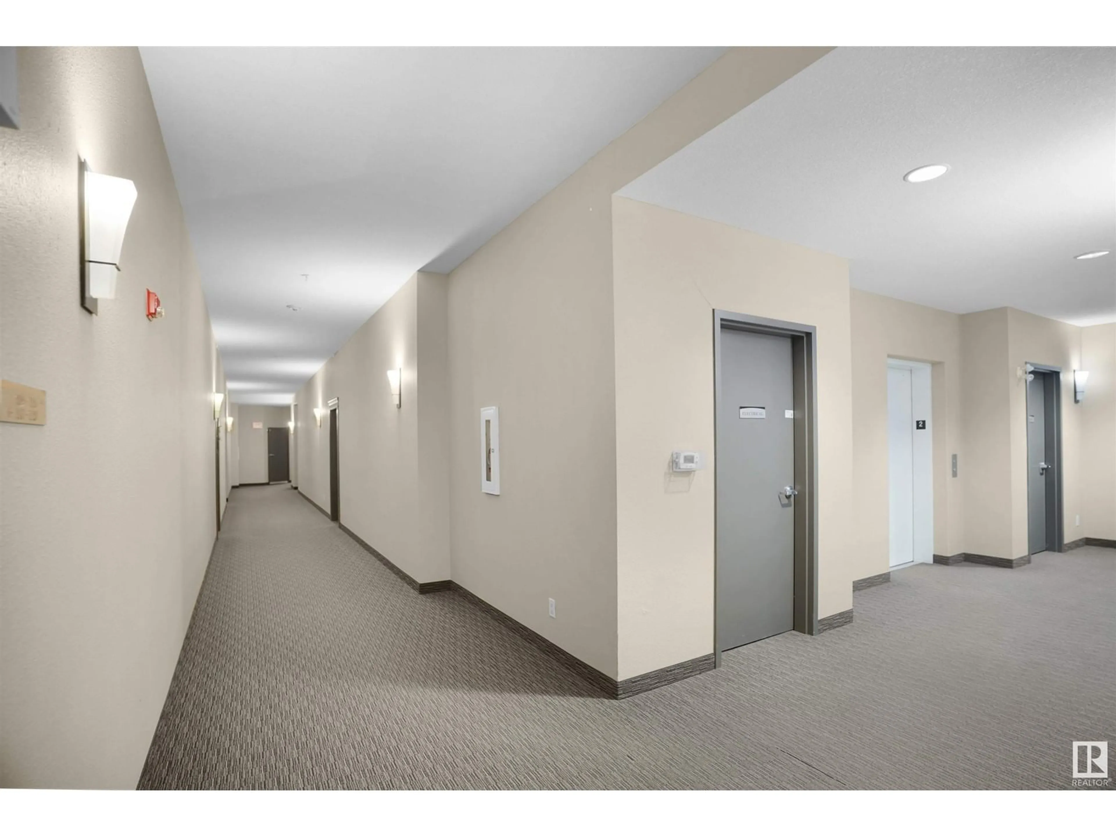 Indoor foyer for 210 - 6083 MAYNARD WY, Edmonton Alberta T6R0S5