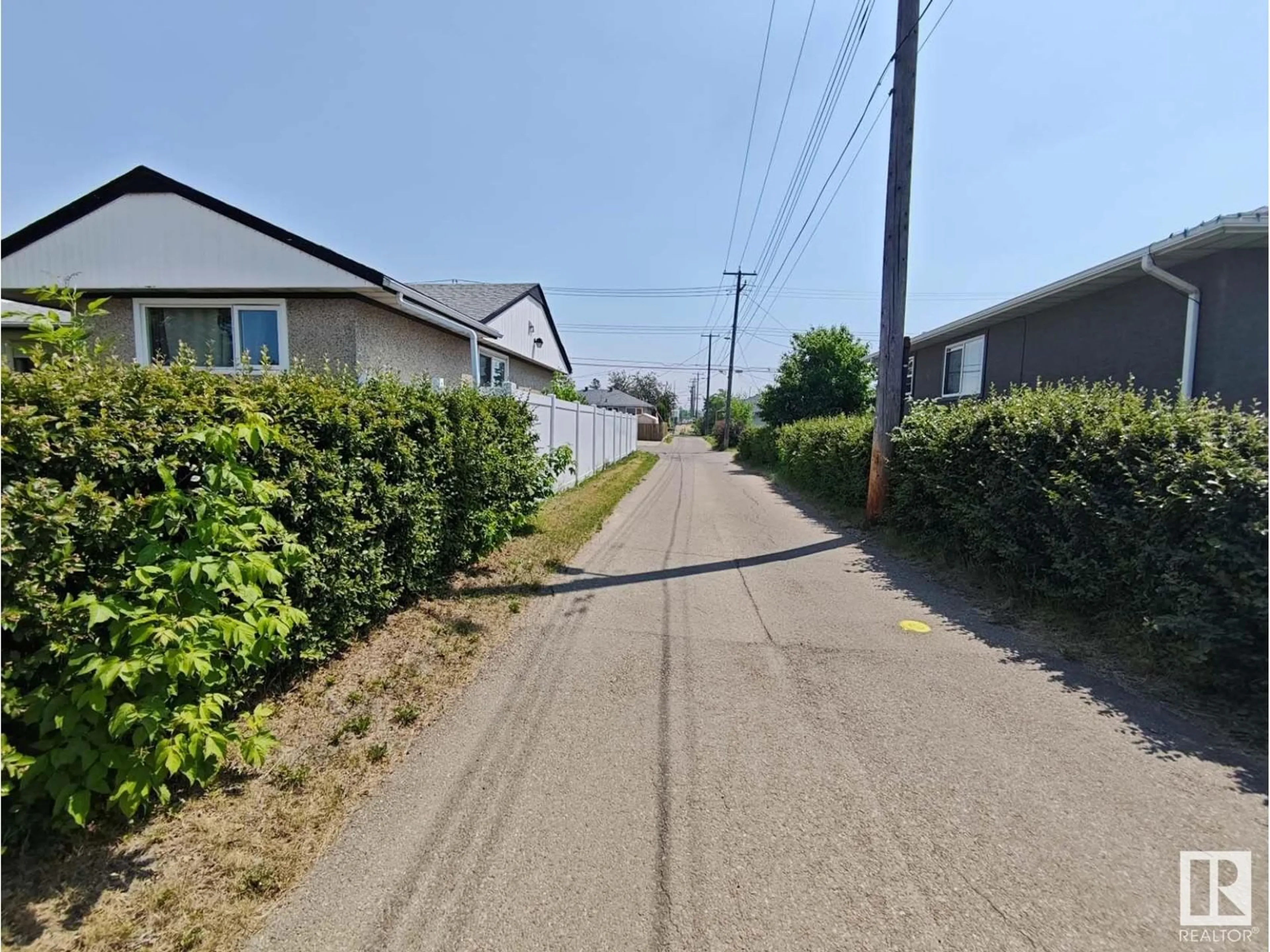 A pic from outside/outdoor area/front of a property/back of a property/a pic from drone, street for 8023 70 AV, Edmonton Alberta T6C0A6