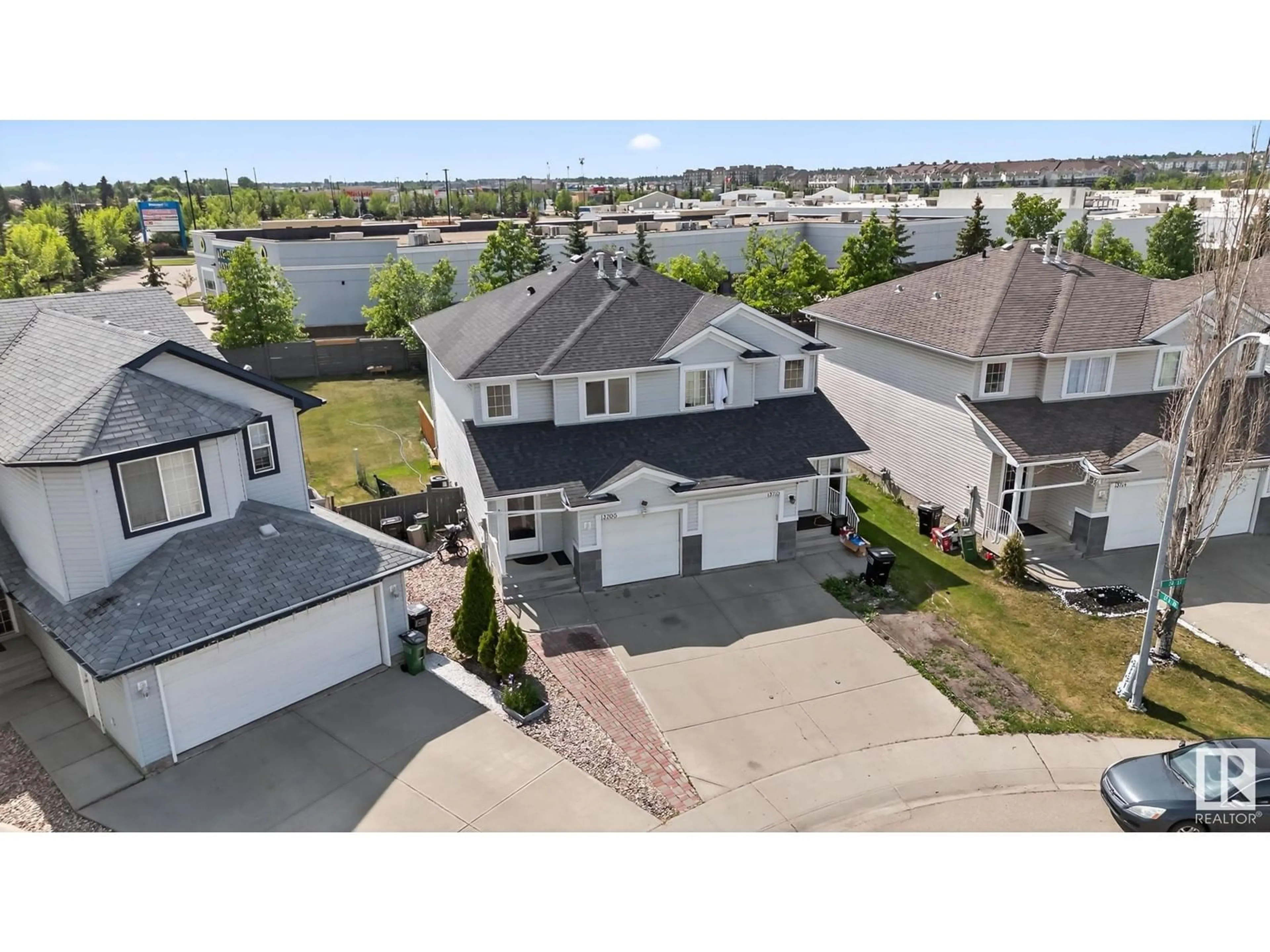 A pic from outside/outdoor area/front of a property/back of a property/a pic from drone, street for 13706 38 ST, Edmonton Alberta T5Y3G7