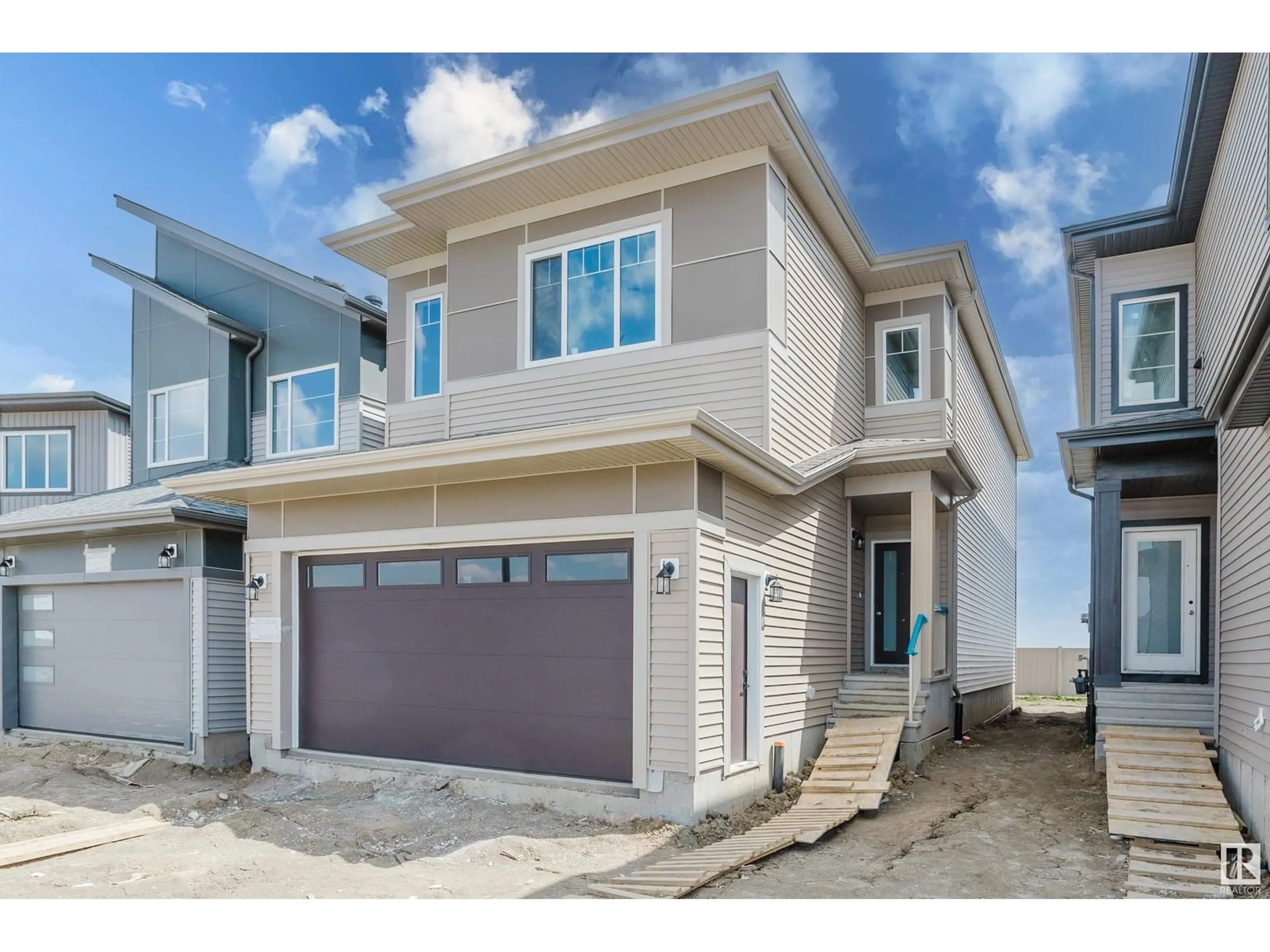 Home with vinyl exterior material, street for 18911 24 AV, Edmonton Alberta T6M3H9