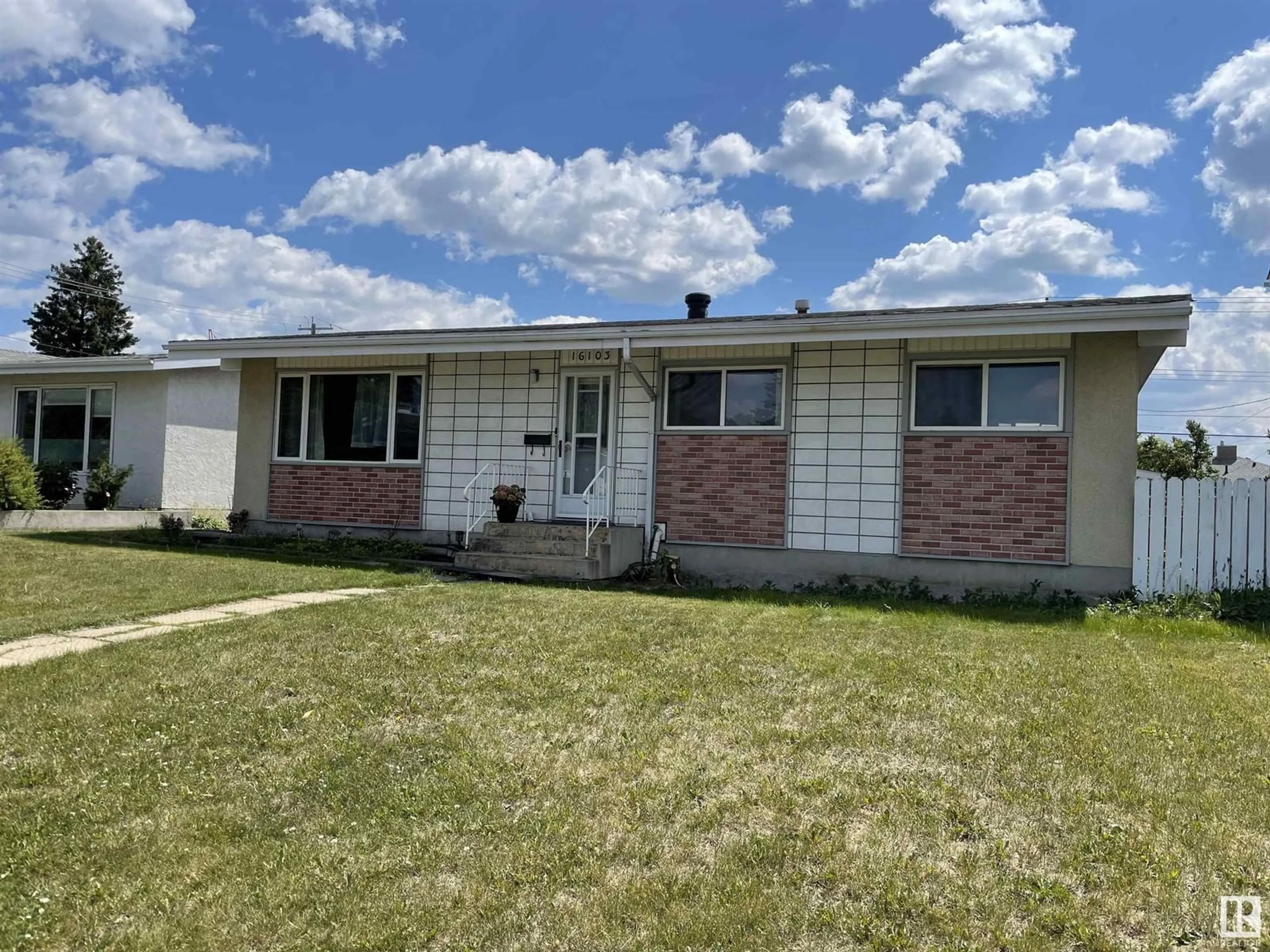 Home with vinyl exterior material, street for 16103 87A AV NW, Edmonton Alberta T5R4H6