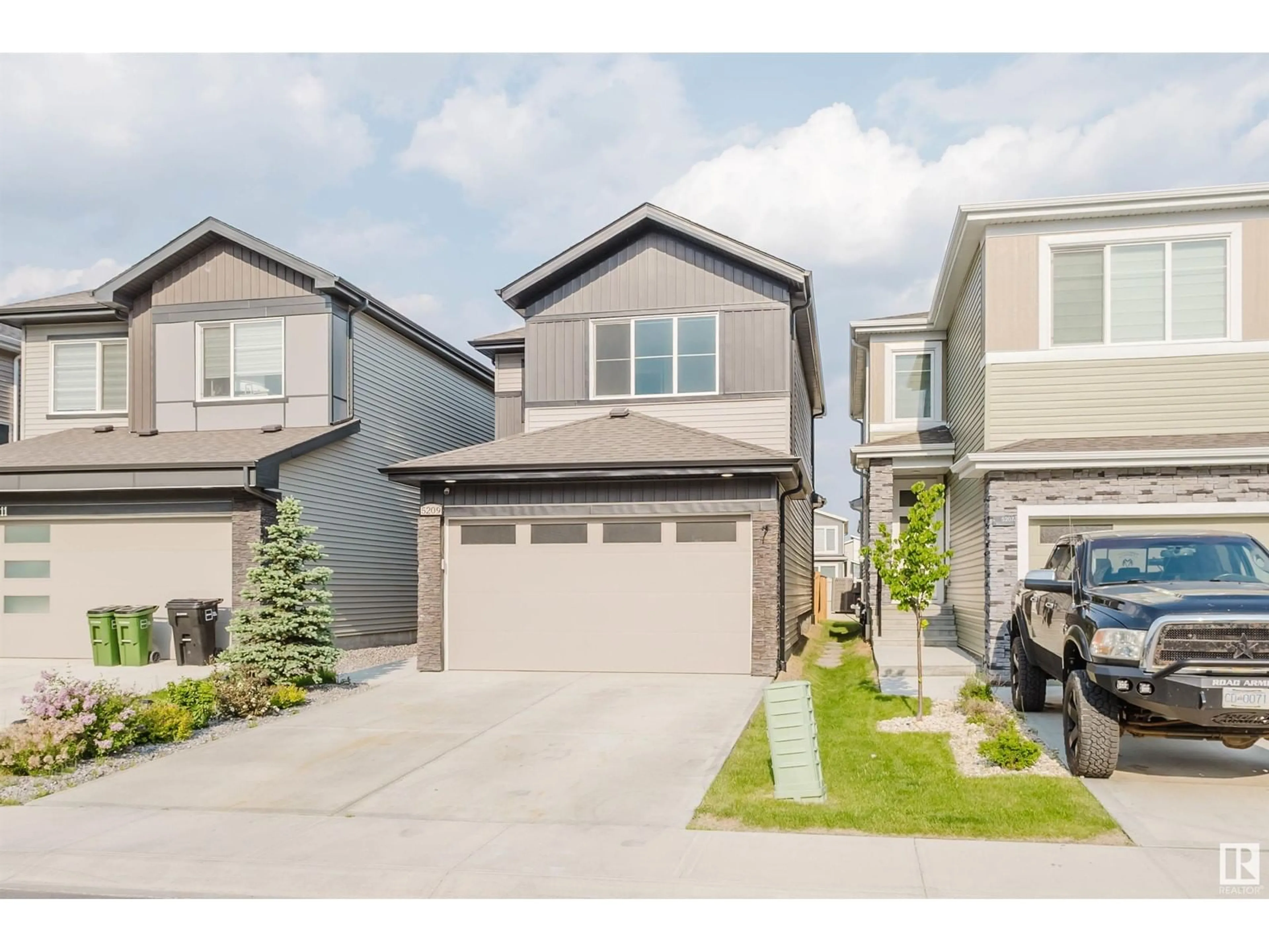 Home with vinyl exterior material, street for 5209 KIMBALL CRES, Edmonton Alberta T6W4Z2