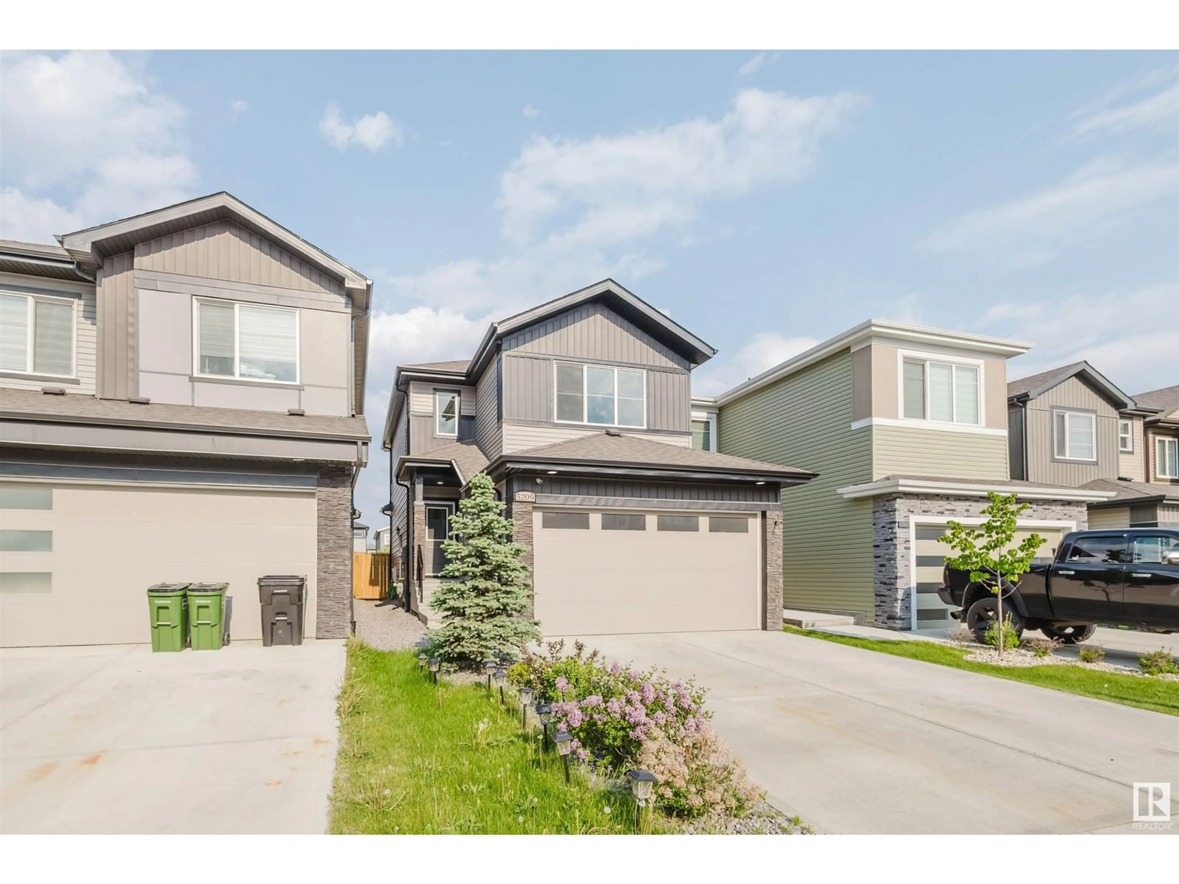 Home with vinyl exterior material, street for 5209 KIMBALL CRES, Edmonton Alberta T6W4Z2