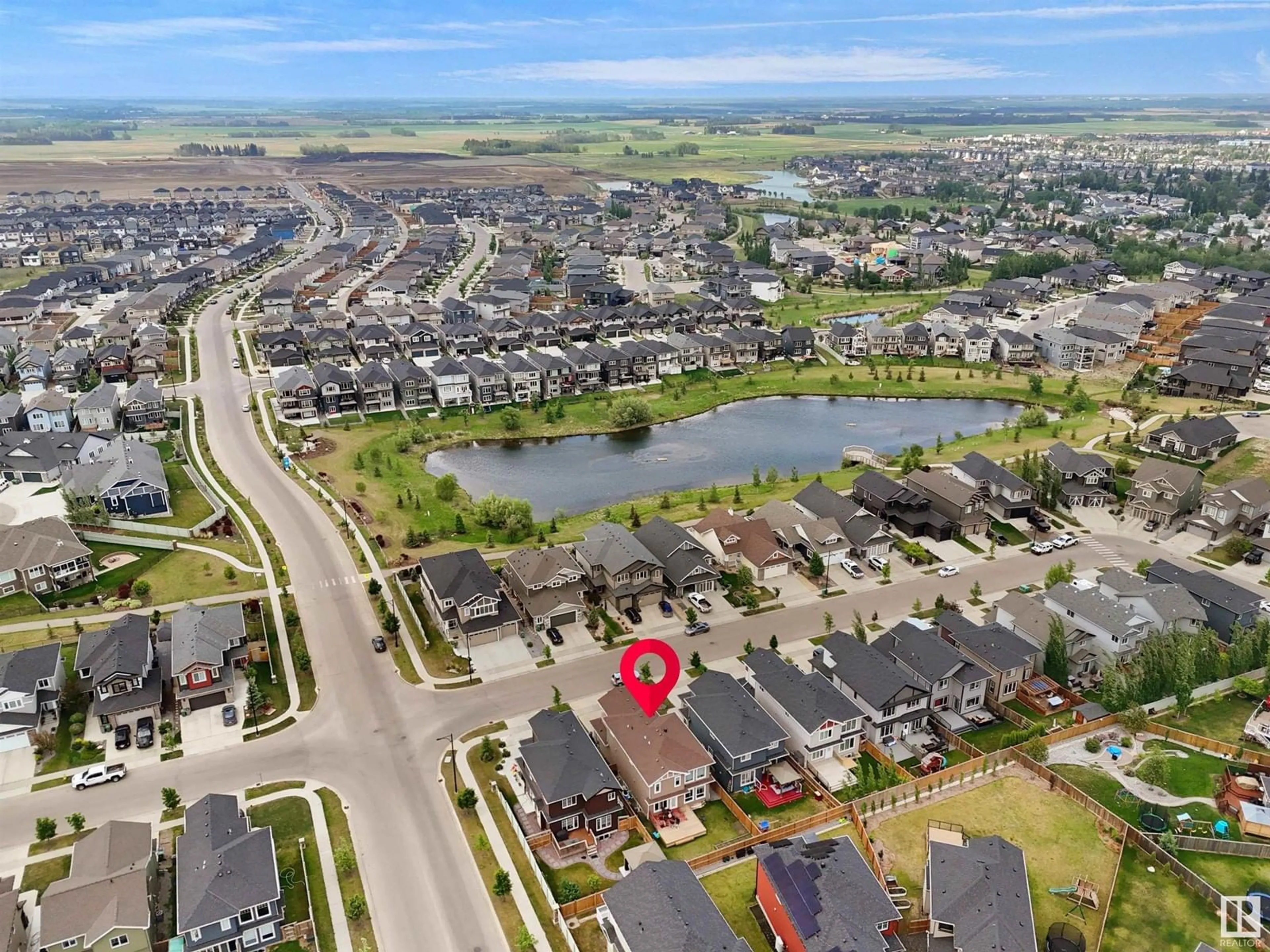 A pic from outside/outdoor area/front of a property/back of a property/a pic from drone, water/lake/river/ocean view for 3804 48 AV, Beaumont Alberta T4Z1Y8