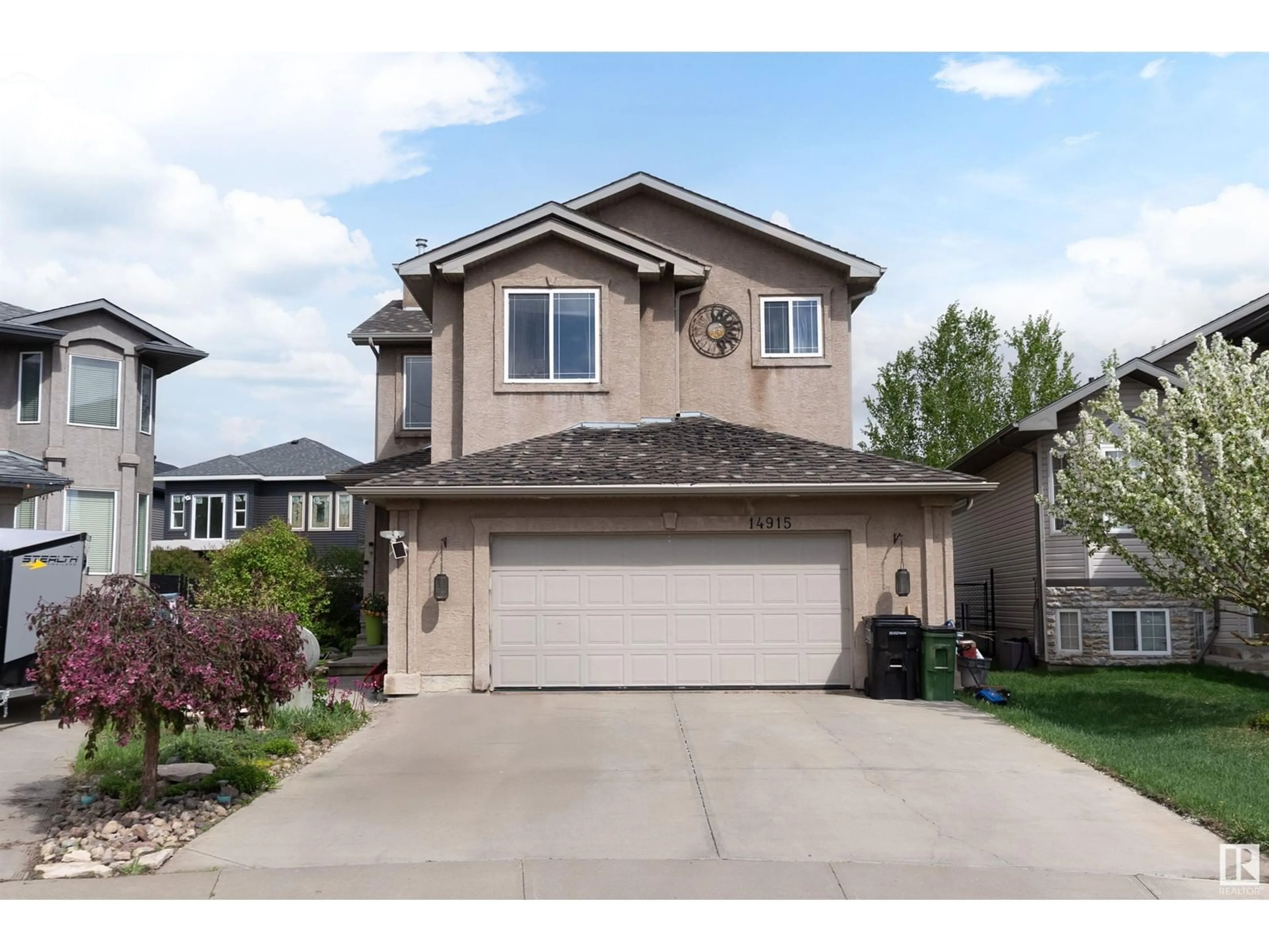 Home with vinyl exterior material, street for 14915 16 ST, Edmonton Alberta T5Y3J1