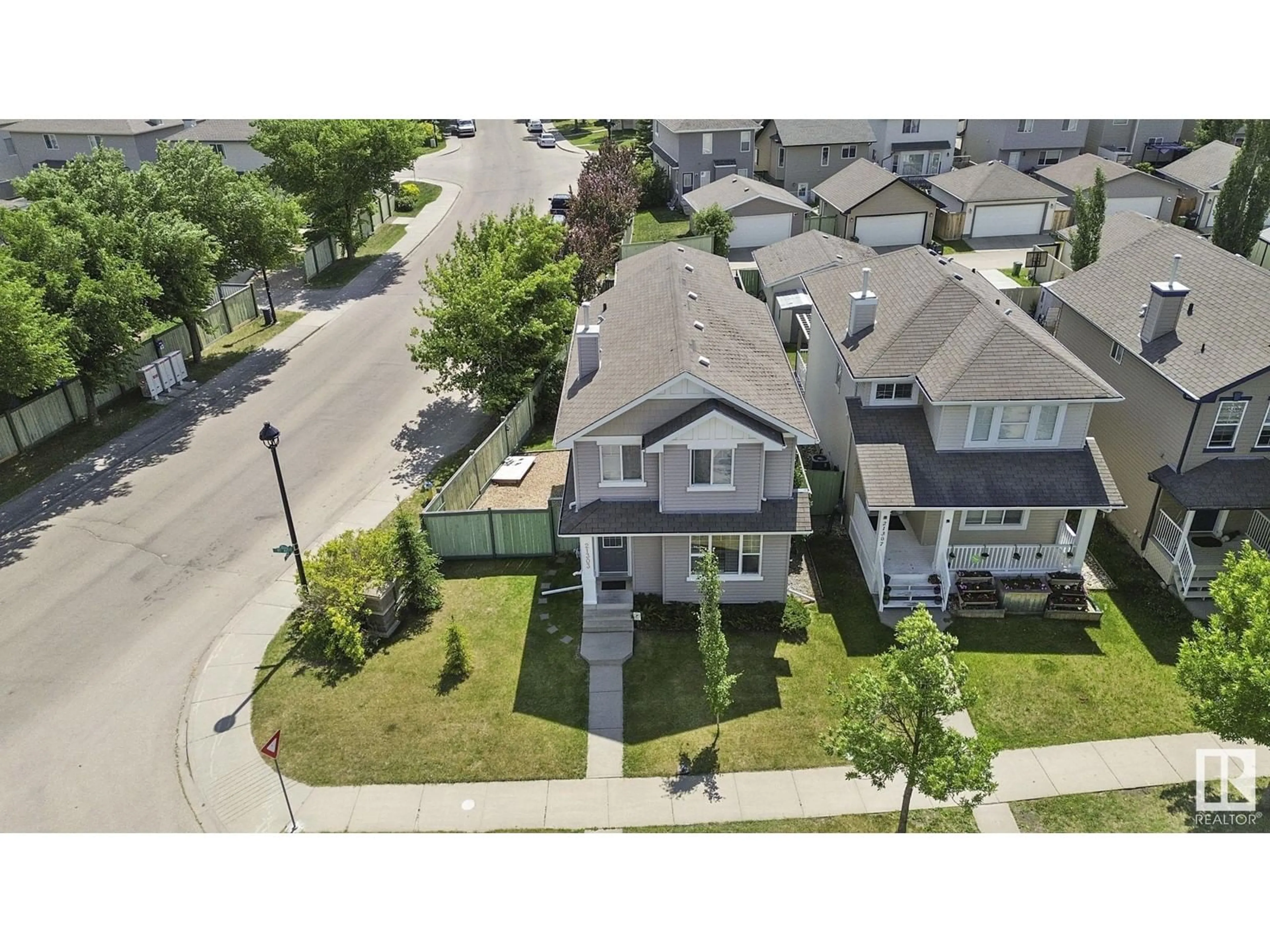A pic from outside/outdoor area/front of a property/back of a property/a pic from drone, street for 21303 91 AV, Edmonton Alberta T5T6Y9