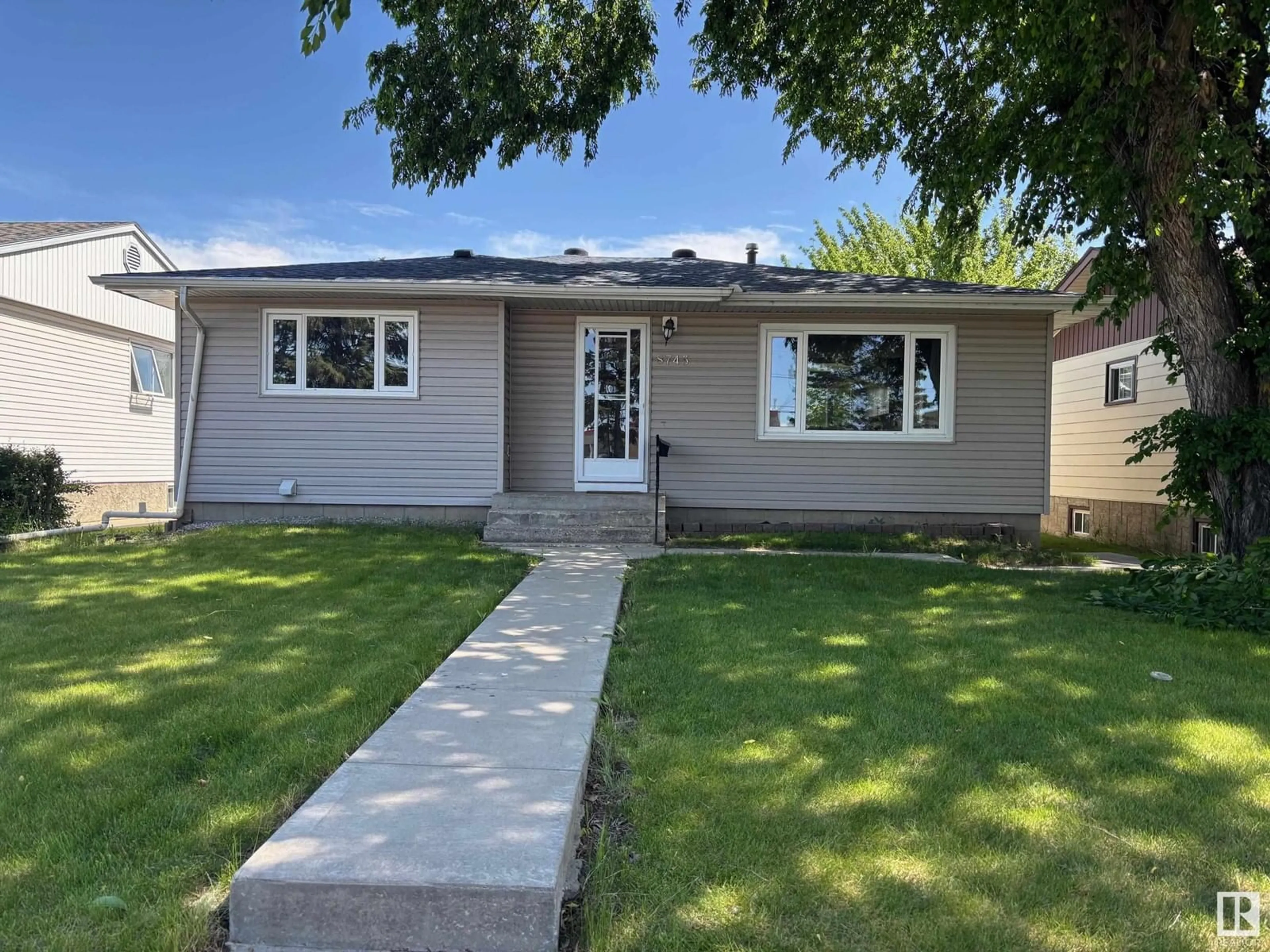 Home with vinyl exterior material, street for NW - 8745 155 ST, Edmonton Alberta T5R1W1