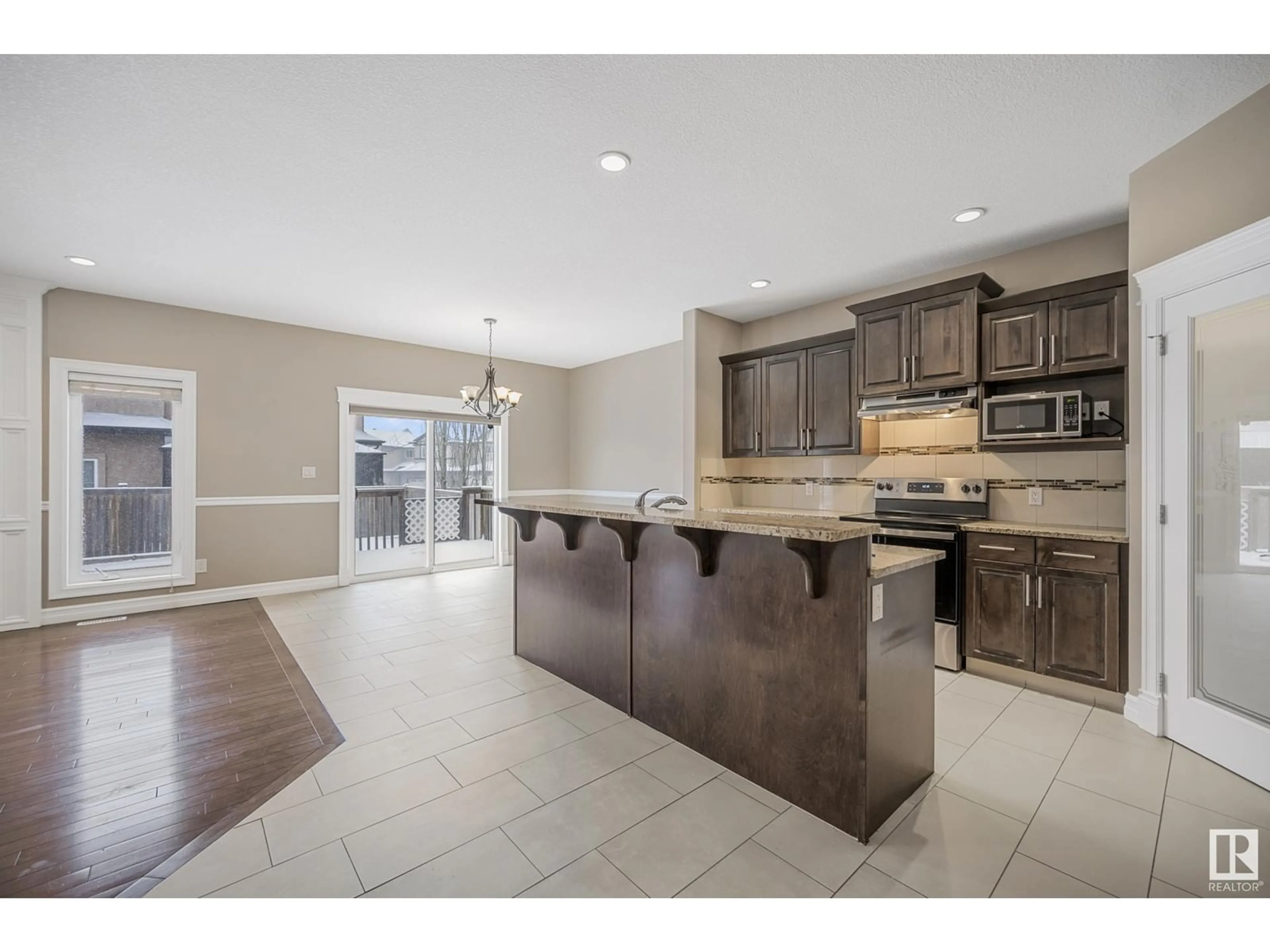 Open concept kitchen, ceramic/tile floor for 1314 CUNNINGHAM DR, Edmonton Alberta T6W0R7