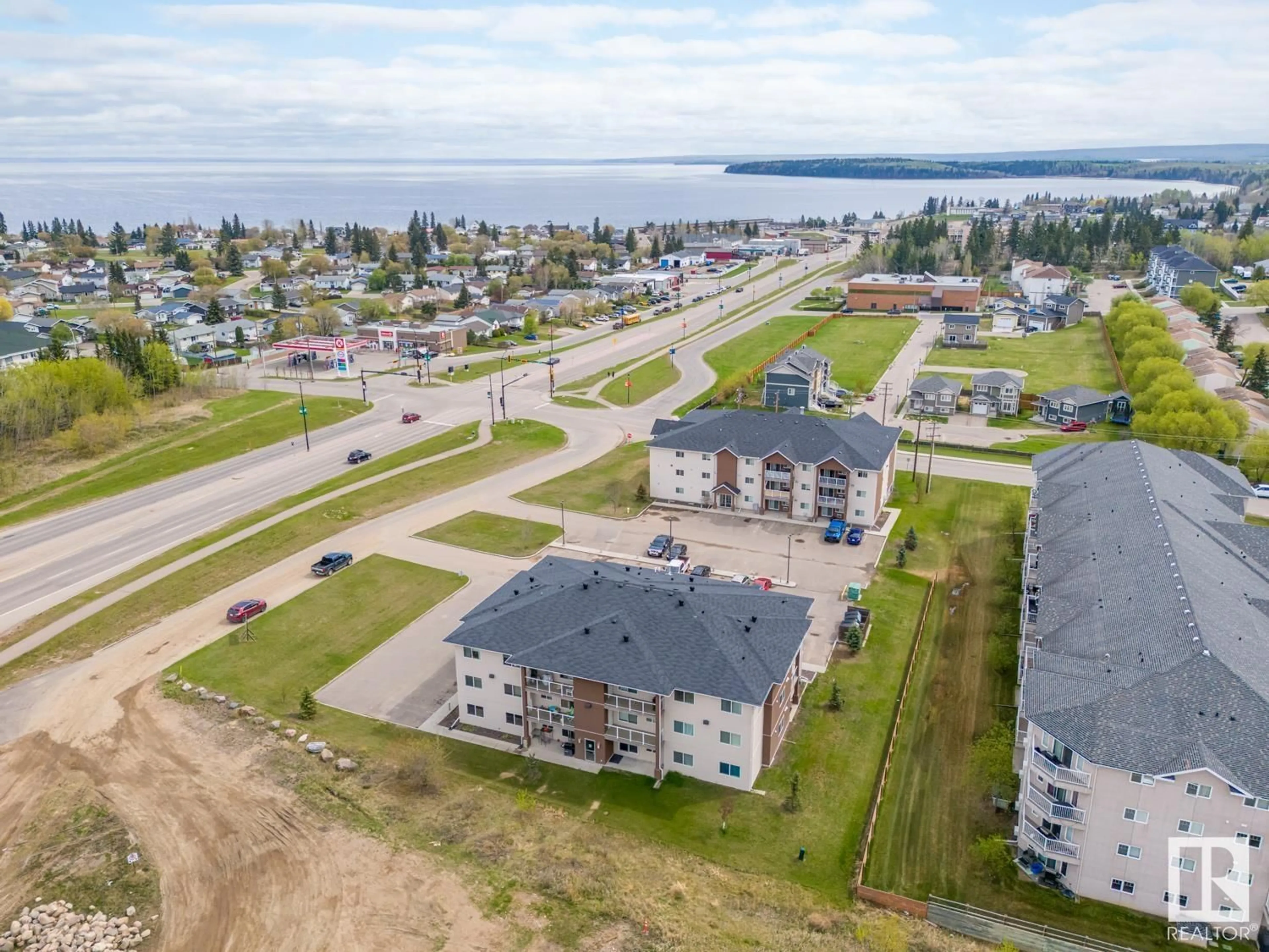 A pic from outside/outdoor area/front of a property/back of a property/a pic from drone, water/lake/river/ocean view for 2201 1601 8 AV, Cold Lake Alberta T9M0J9
