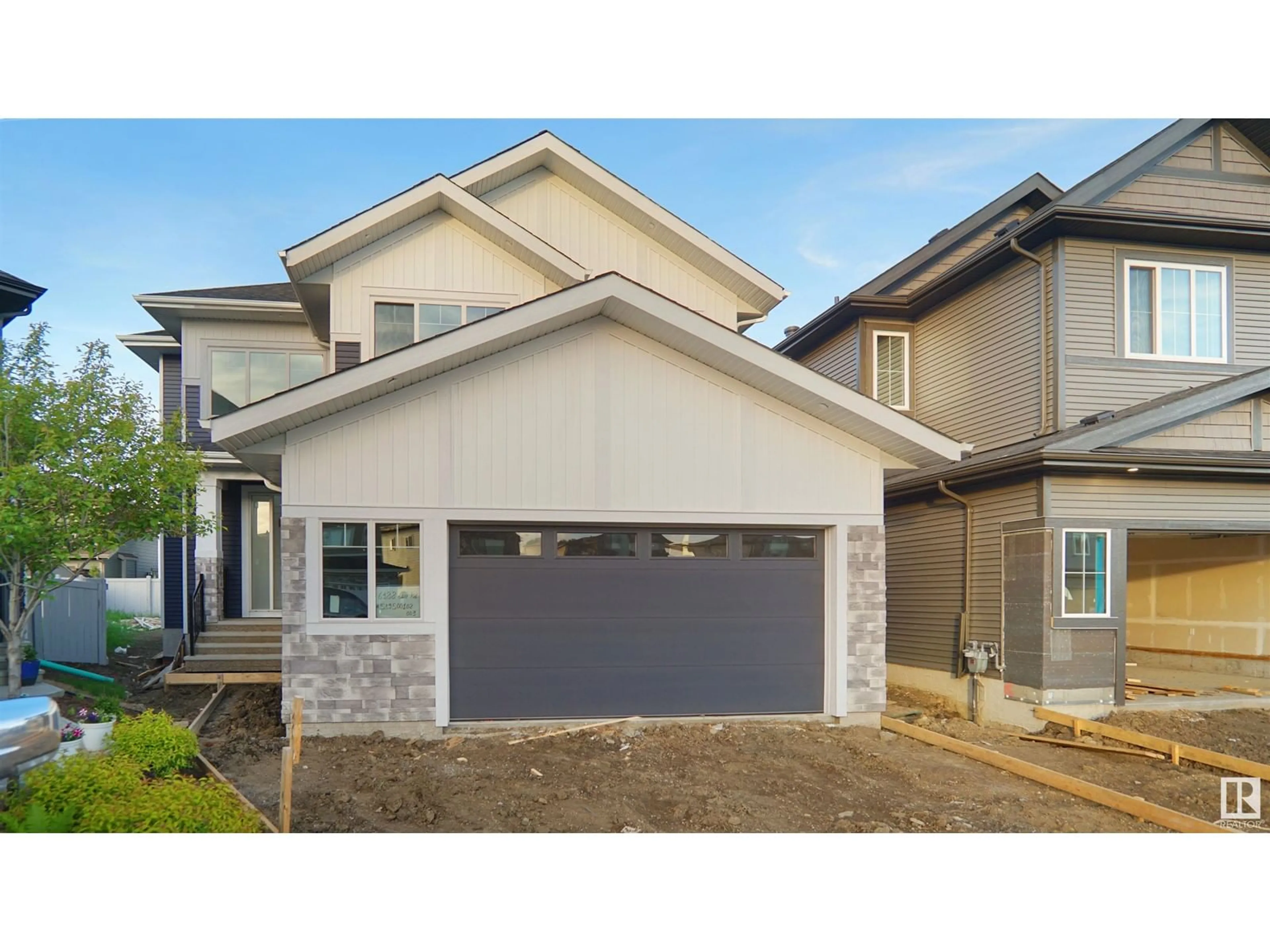 Home with vinyl exterior material, street for 6188 CARR RD, Edmonton Alberta T5E6Y5