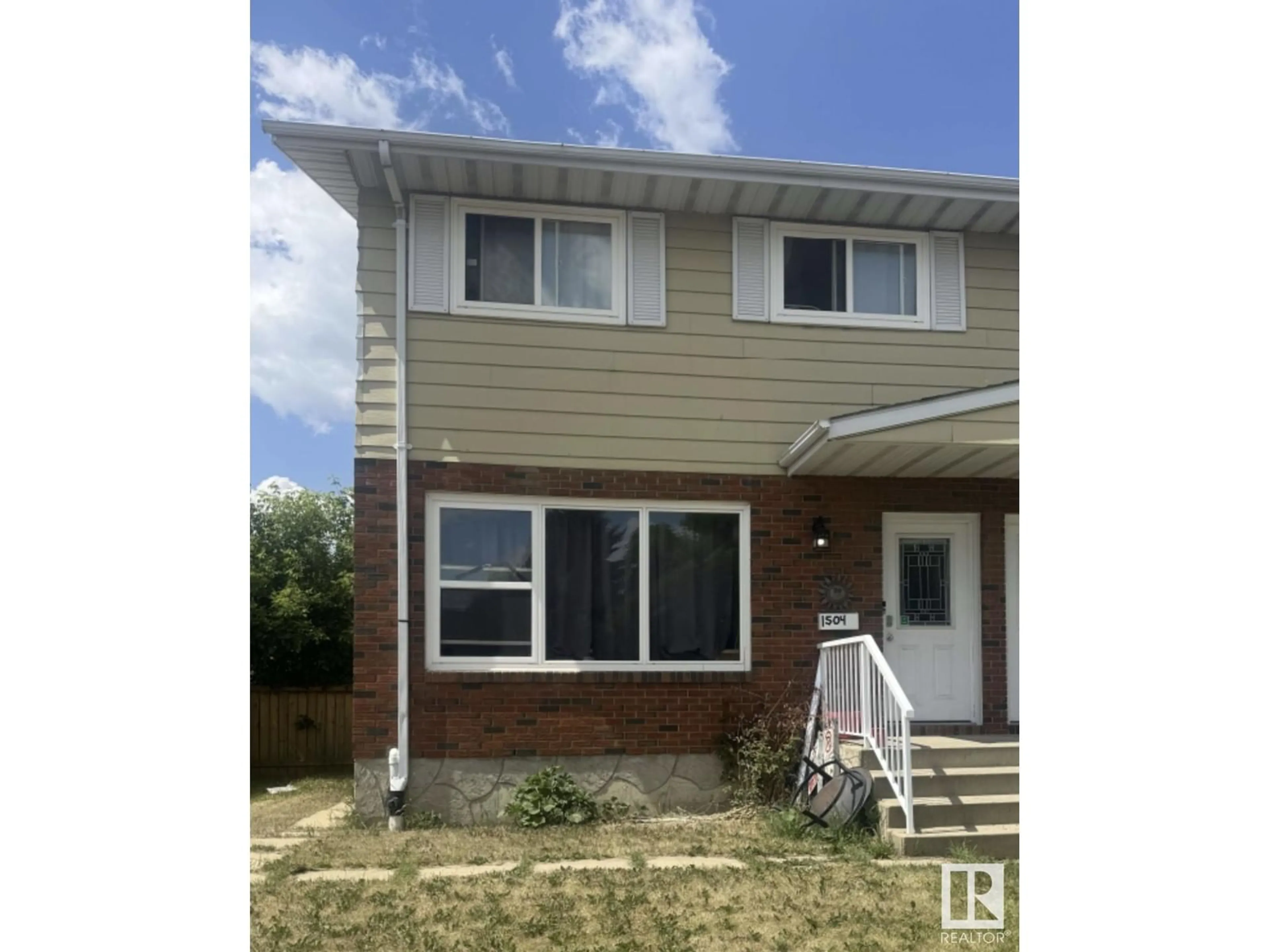 Home with vinyl exterior material, street for 1504 62 ST, Edmonton Alberta T6L1S8