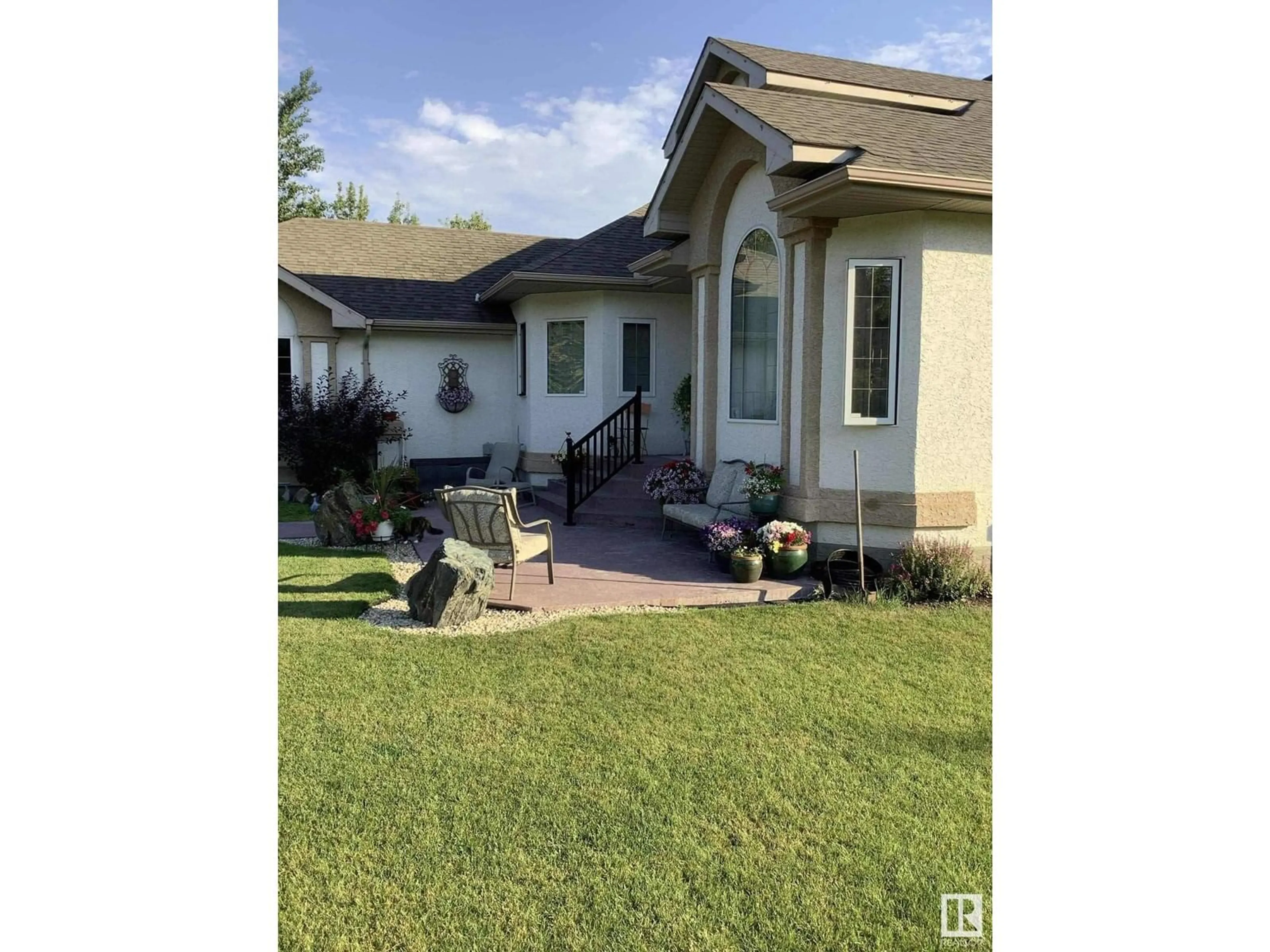 Home with vinyl exterior material, street for 21366 TWP ROAD 530, Rural Strathcona County Alberta T8G2G1
