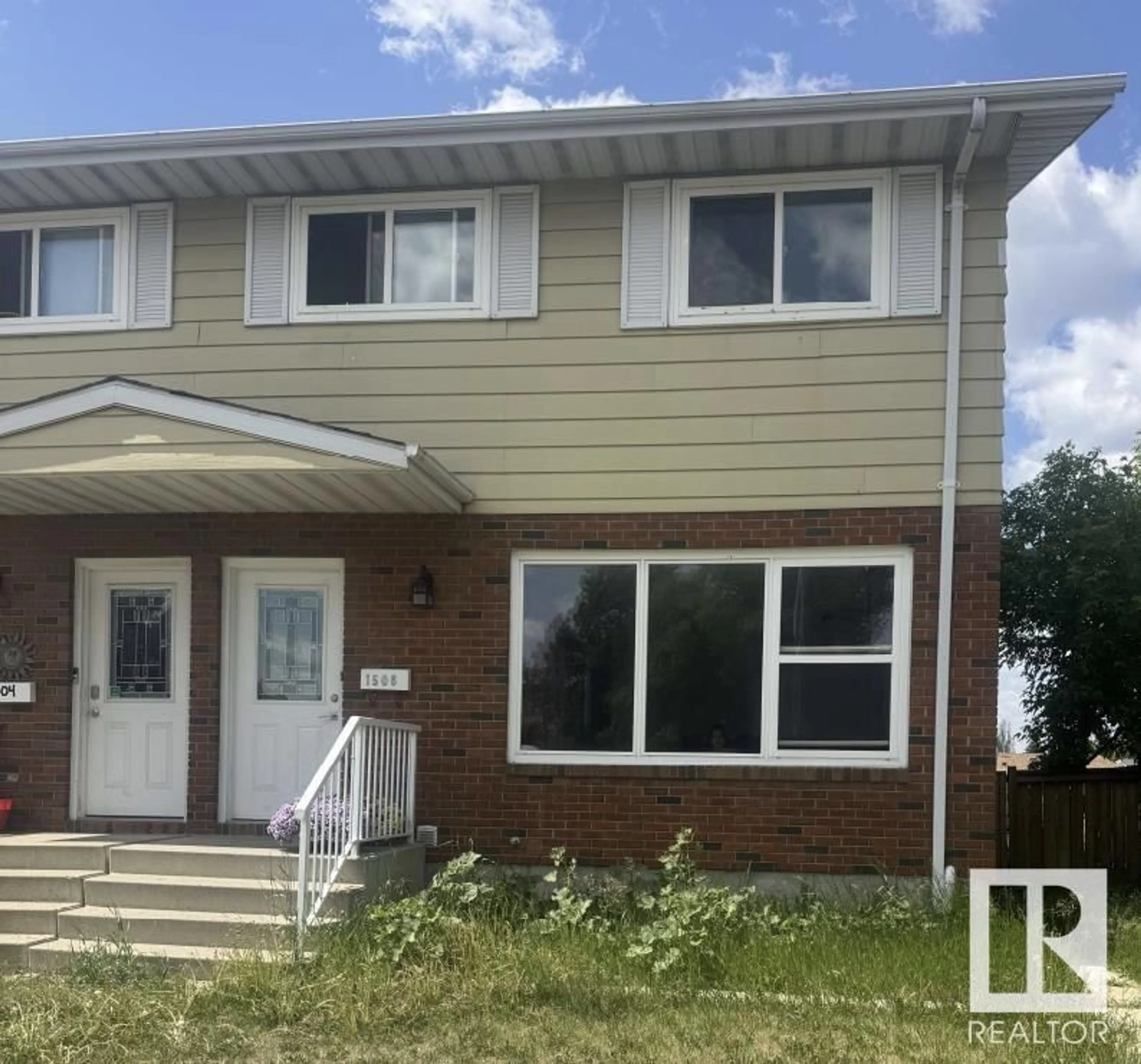 Home with vinyl exterior material, street for 1506 62 ST, Edmonton Alberta T6L1S8