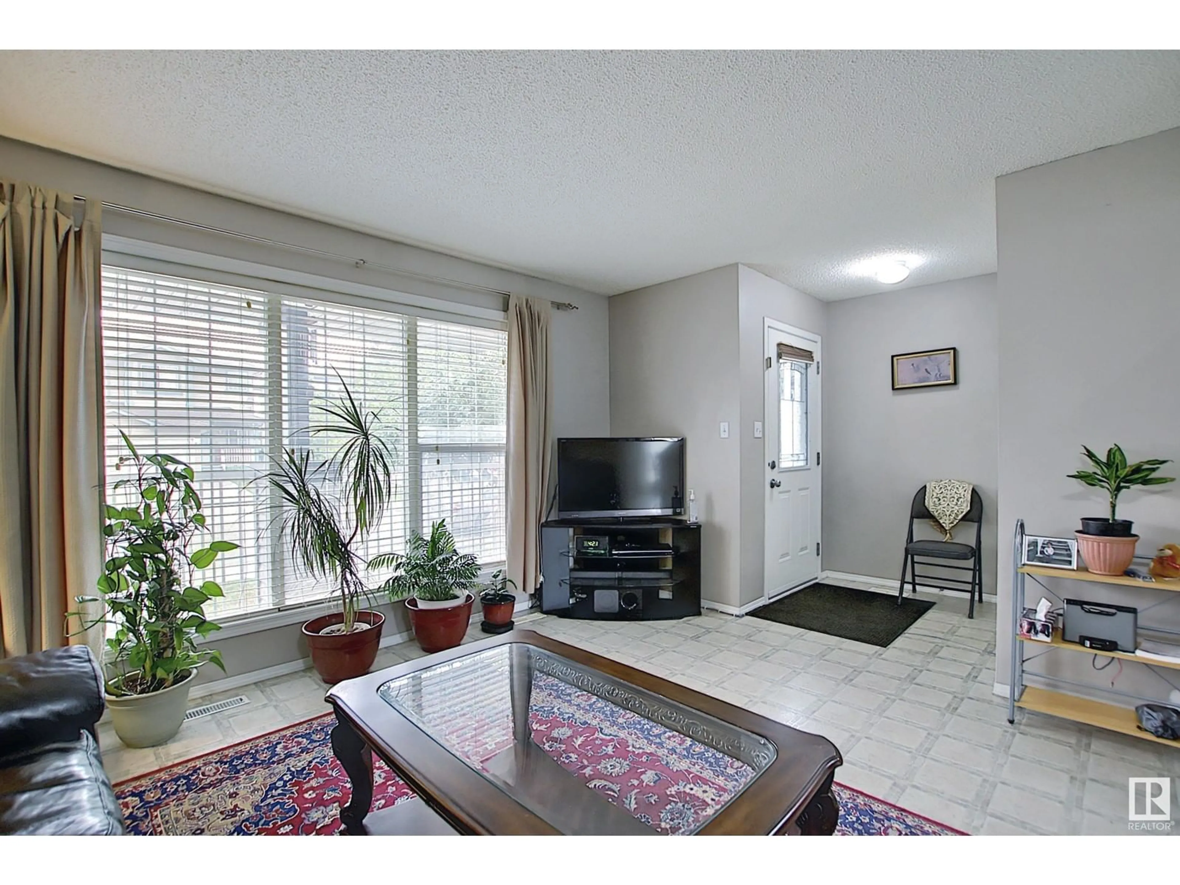 Living room with furniture, unknown for NW - 2919 26 ST, Edmonton Alberta T6T2A2