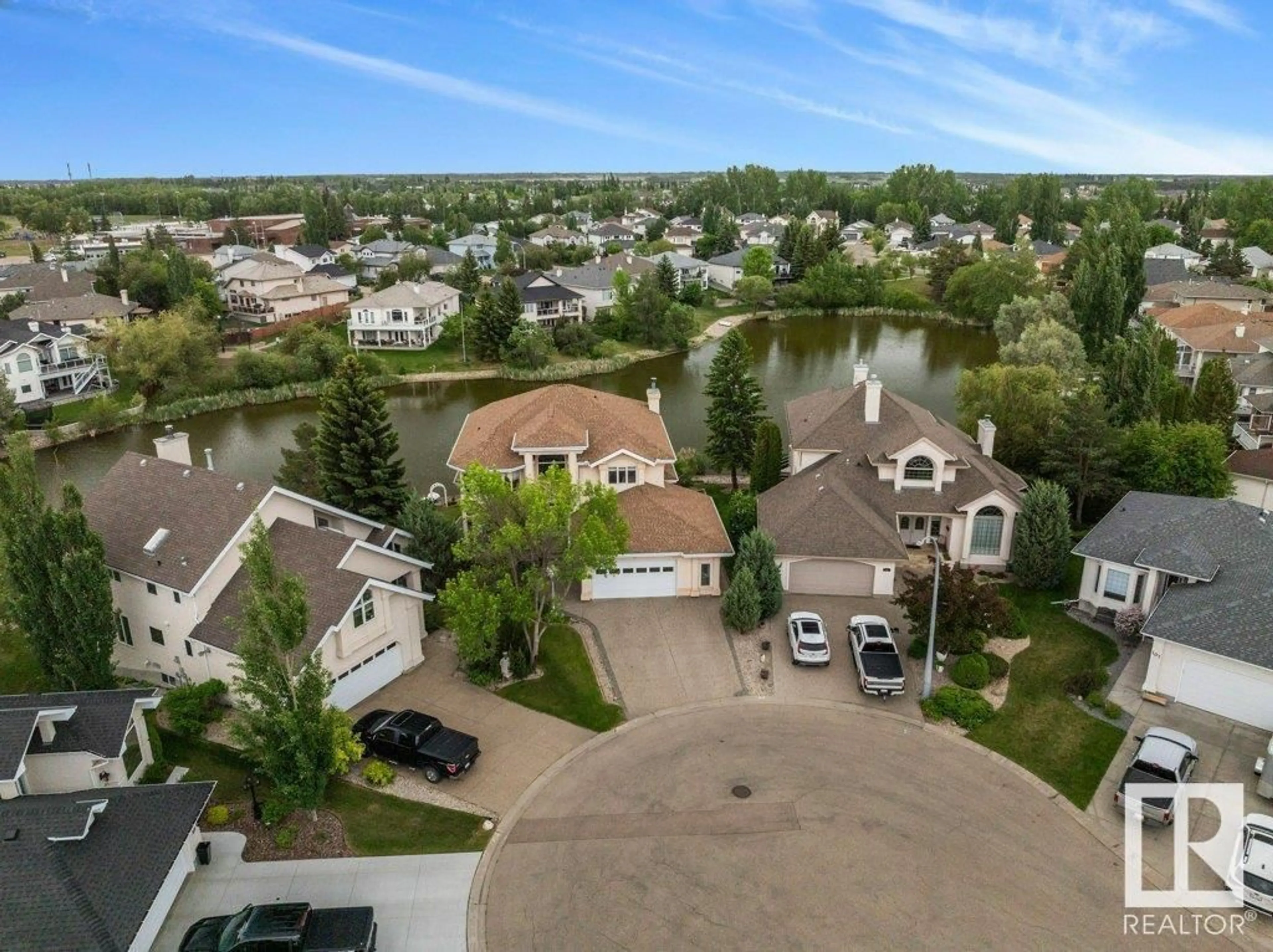 A pic from outside/outdoor area/front of a property/back of a property/a pic from drone, water/lake/river/ocean view for 103 WILLIAM BELL DR, Leduc Alberta T9E6P8