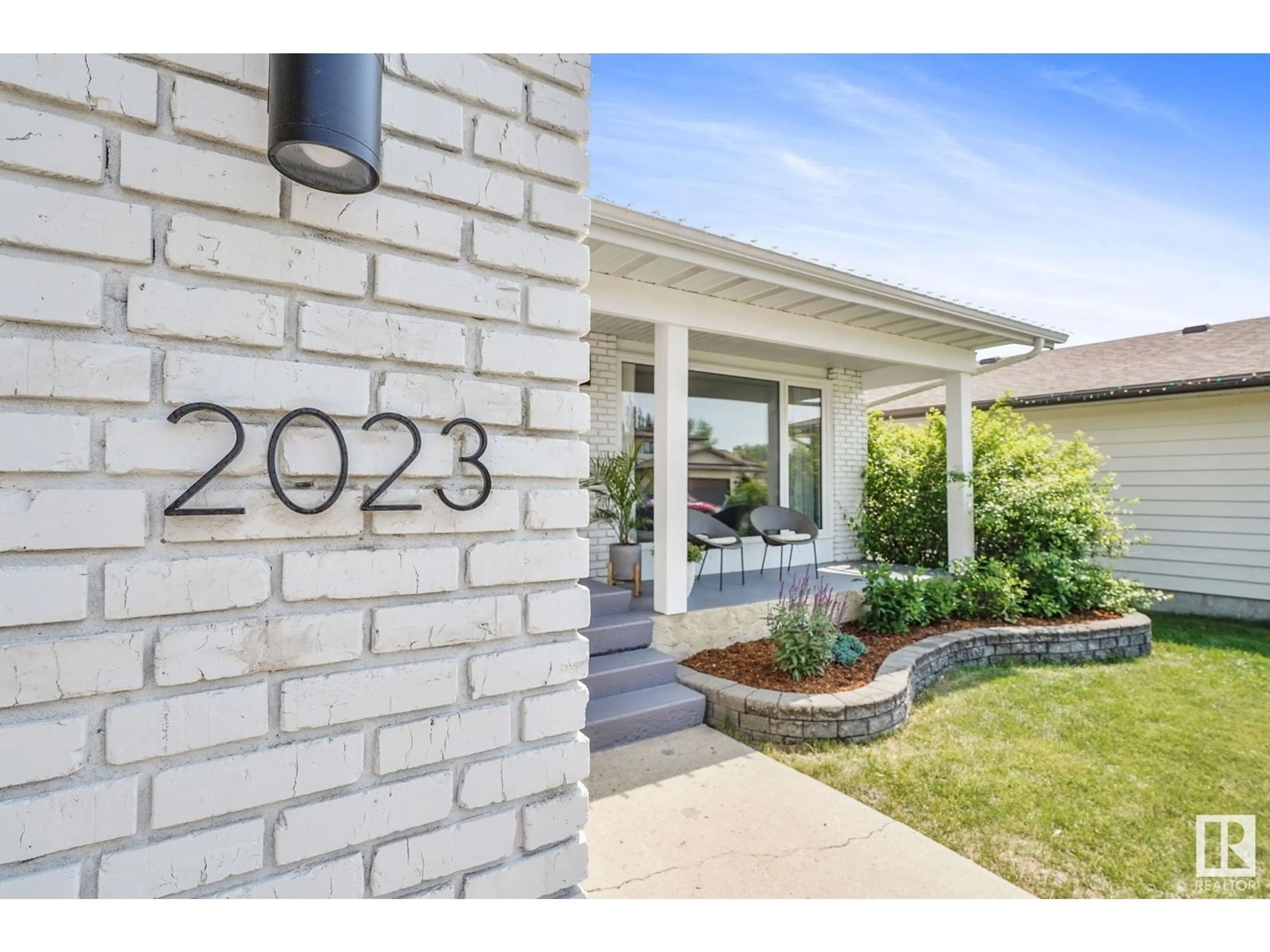 Home with brick exterior material, street for 2023 104B ST NW, Edmonton Alberta T6E5E7