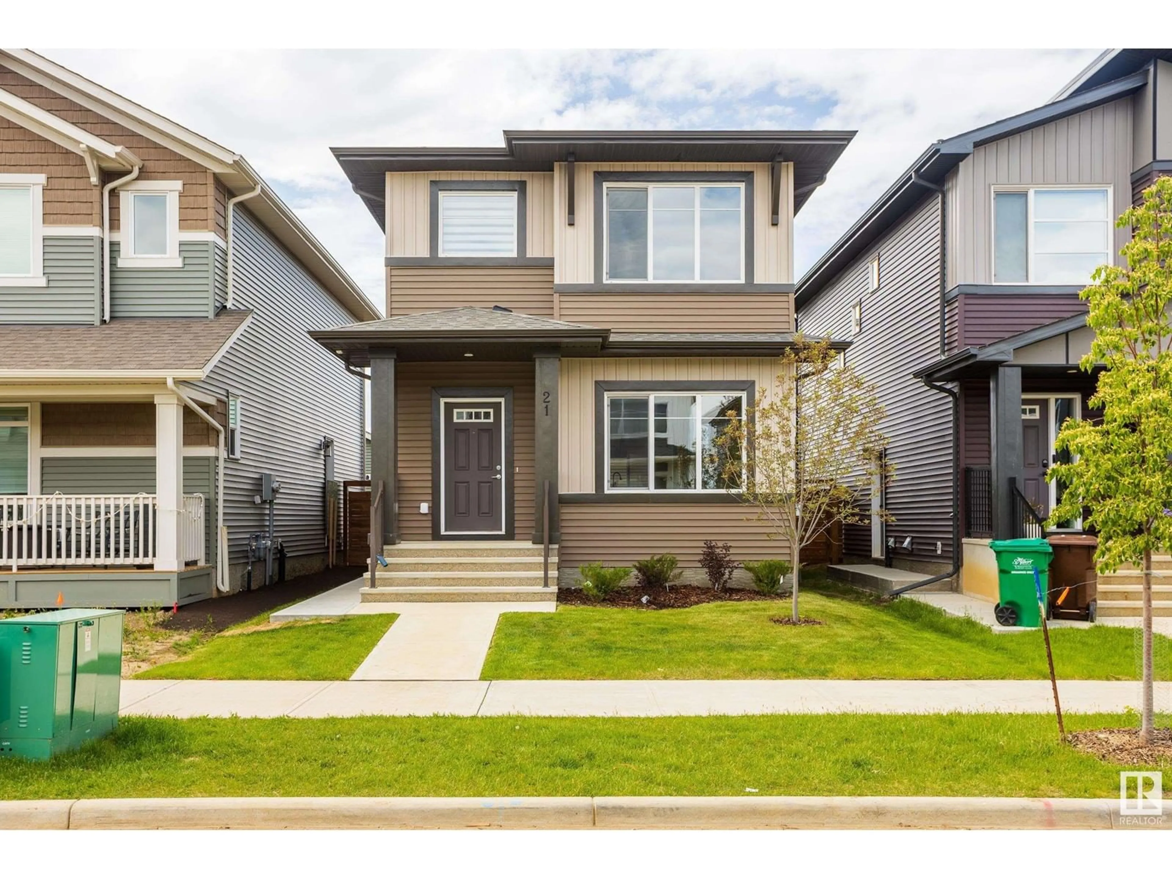 Home with vinyl exterior material, street for 21 RASPBERRY RD, St. Albert Alberta T8N8A3