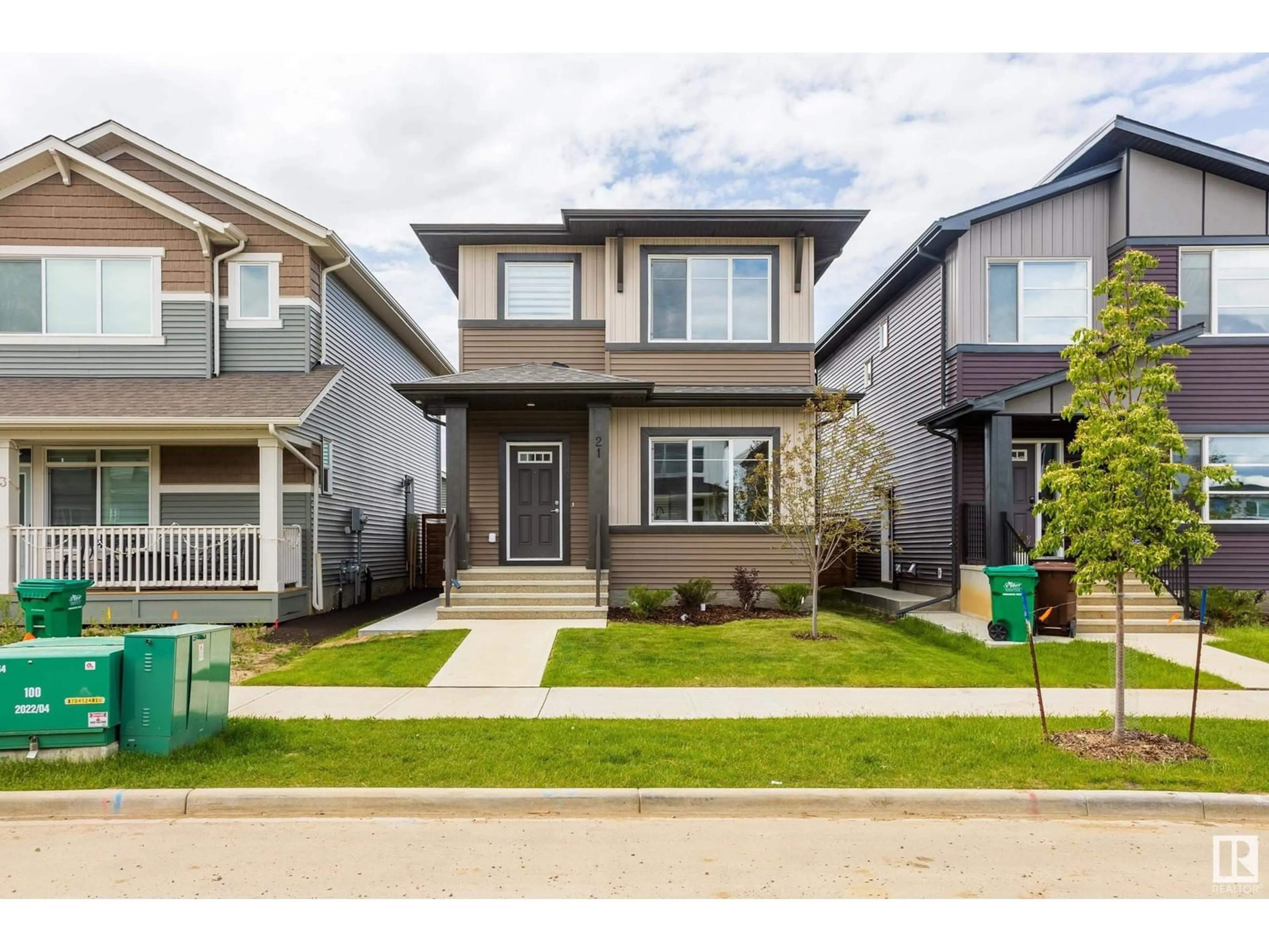 Home with vinyl exterior material, street for 21 RASPBERRY RD, St. Albert Alberta T8N8A3