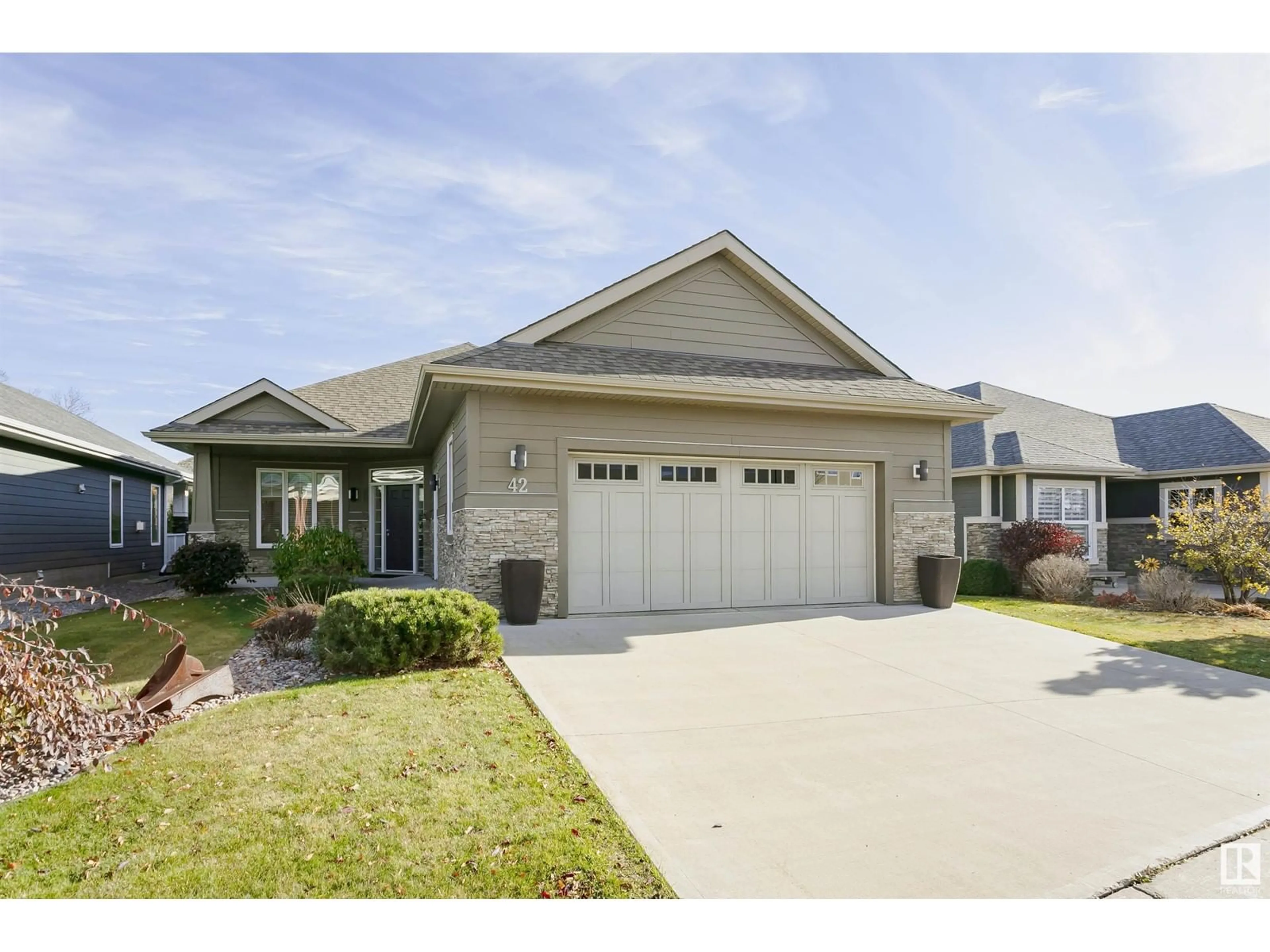 Home with vinyl exterior material, street for 42 18343 LESSARD RD, Edmonton Alberta T6M0A2