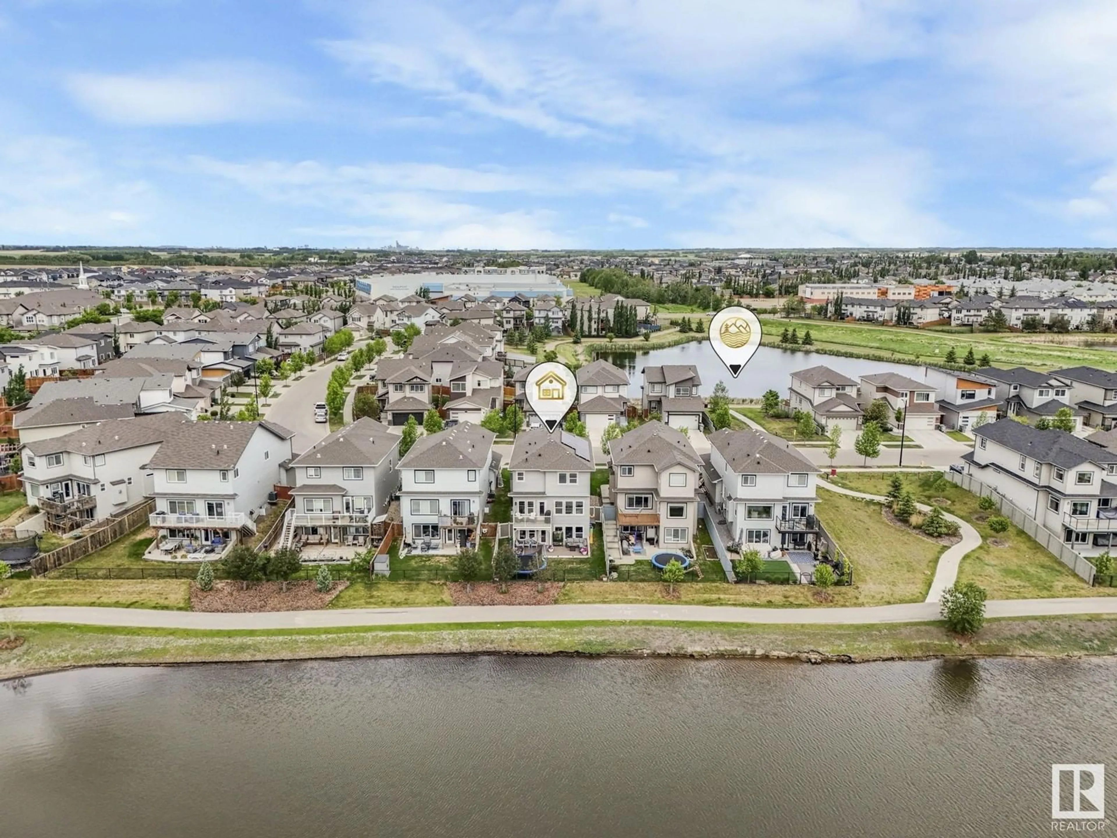 A pic from outside/outdoor area/front of a property/back of a property/a pic from drone, water/lake/river/ocean view for 6425 47 AV, Beaumont Alberta T4X2A1