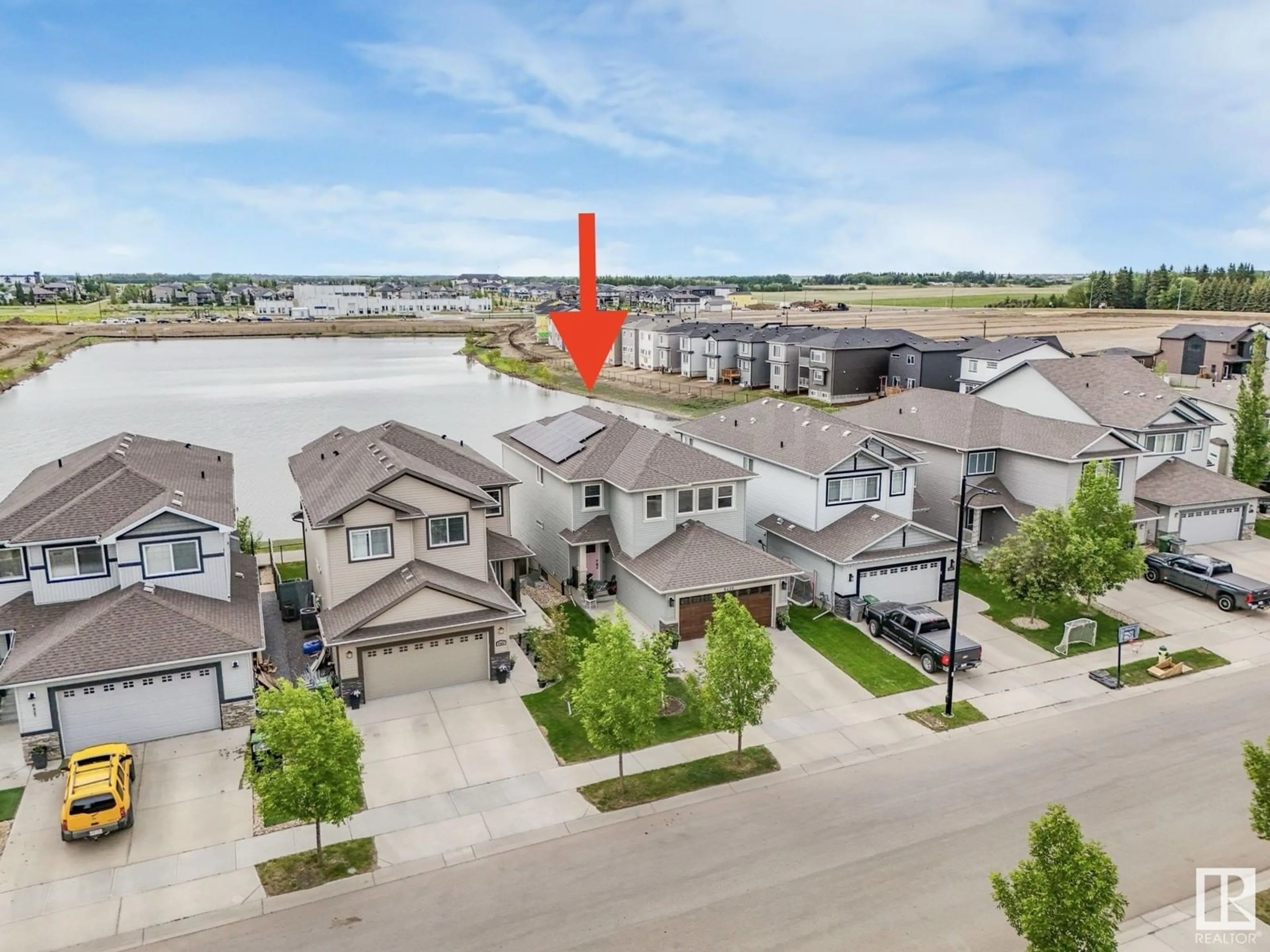A pic from outside/outdoor area/front of a property/back of a property/a pic from drone, unknown for 6425 47 AV, Beaumont Alberta T4X2A1