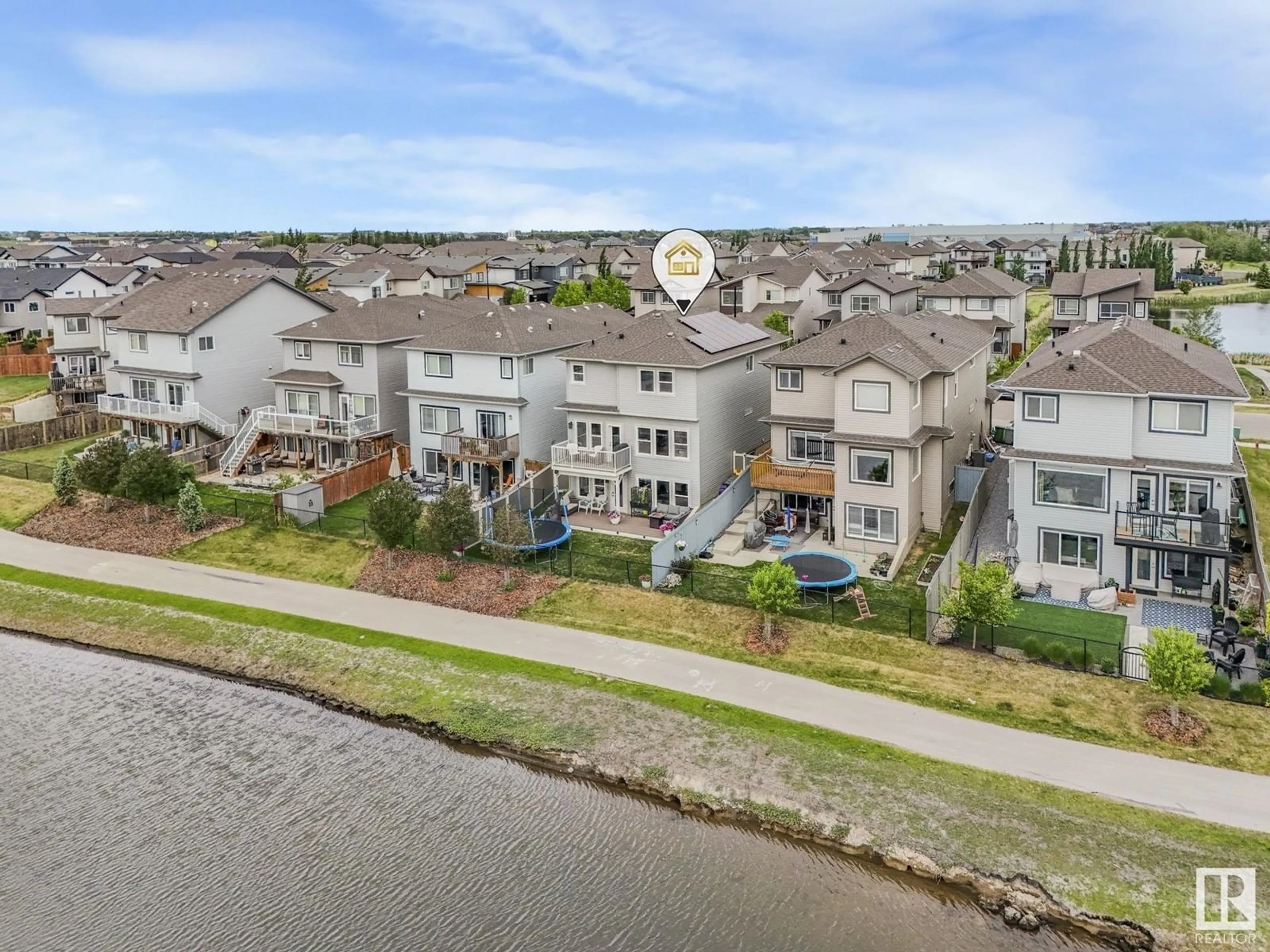 A pic from outside/outdoor area/front of a property/back of a property/a pic from drone, water/lake/river/ocean view for 6425 47 AV, Beaumont Alberta T4X2A1