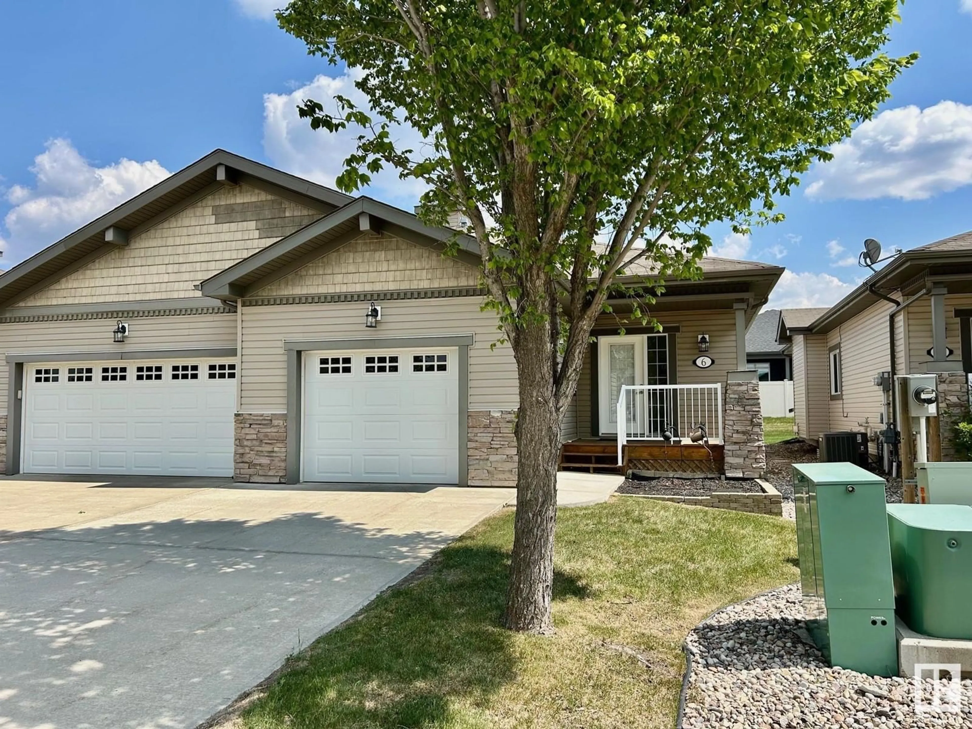 Home with vinyl exterior material, street for #6 - 5021 34 AV, Camrose Alberta T5V5G2
