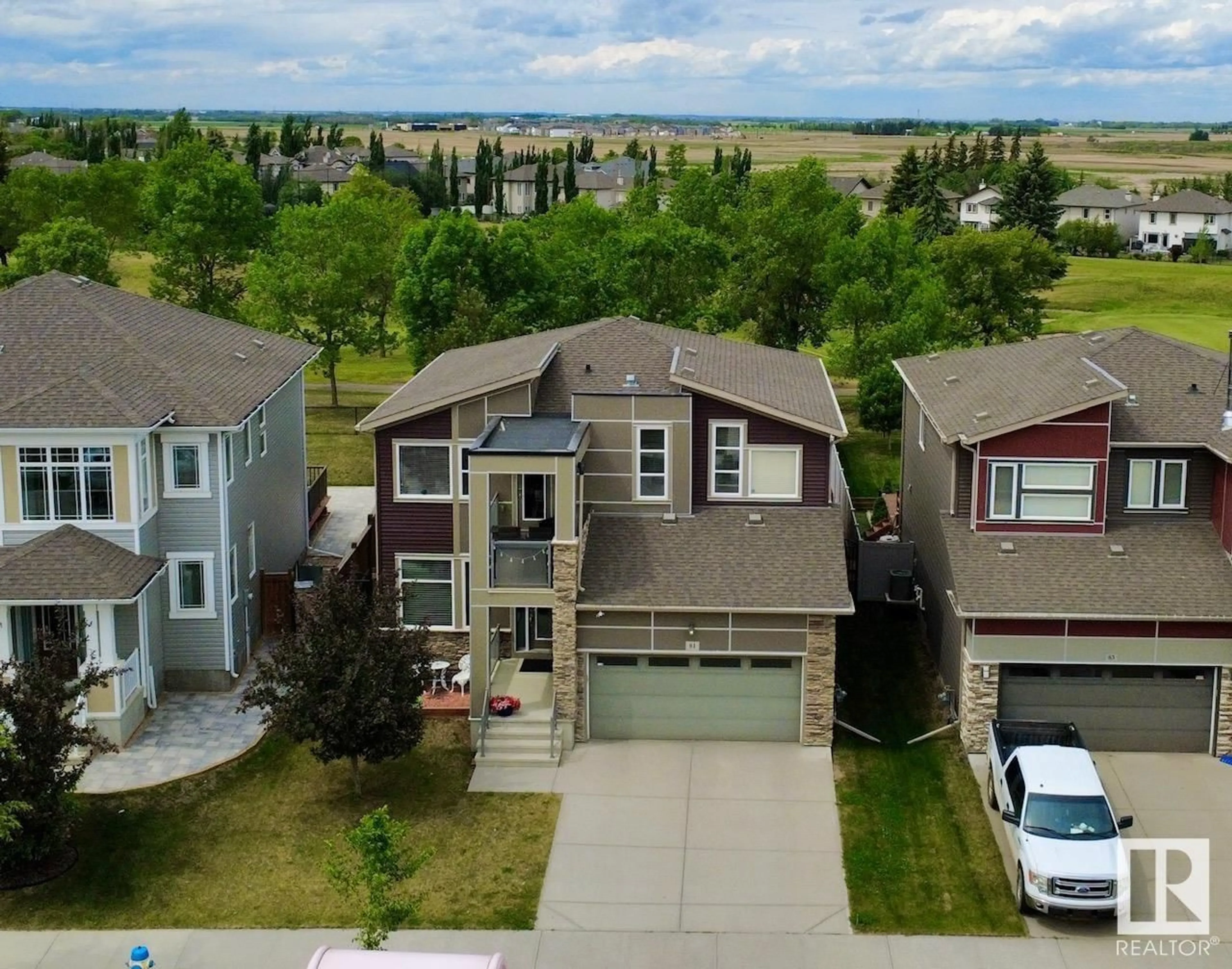 A pic from outside/outdoor area/front of a property/back of a property/a pic from drone, street for 81 ROSEMOUNT BV, Beaumont Alberta T4X1Z5