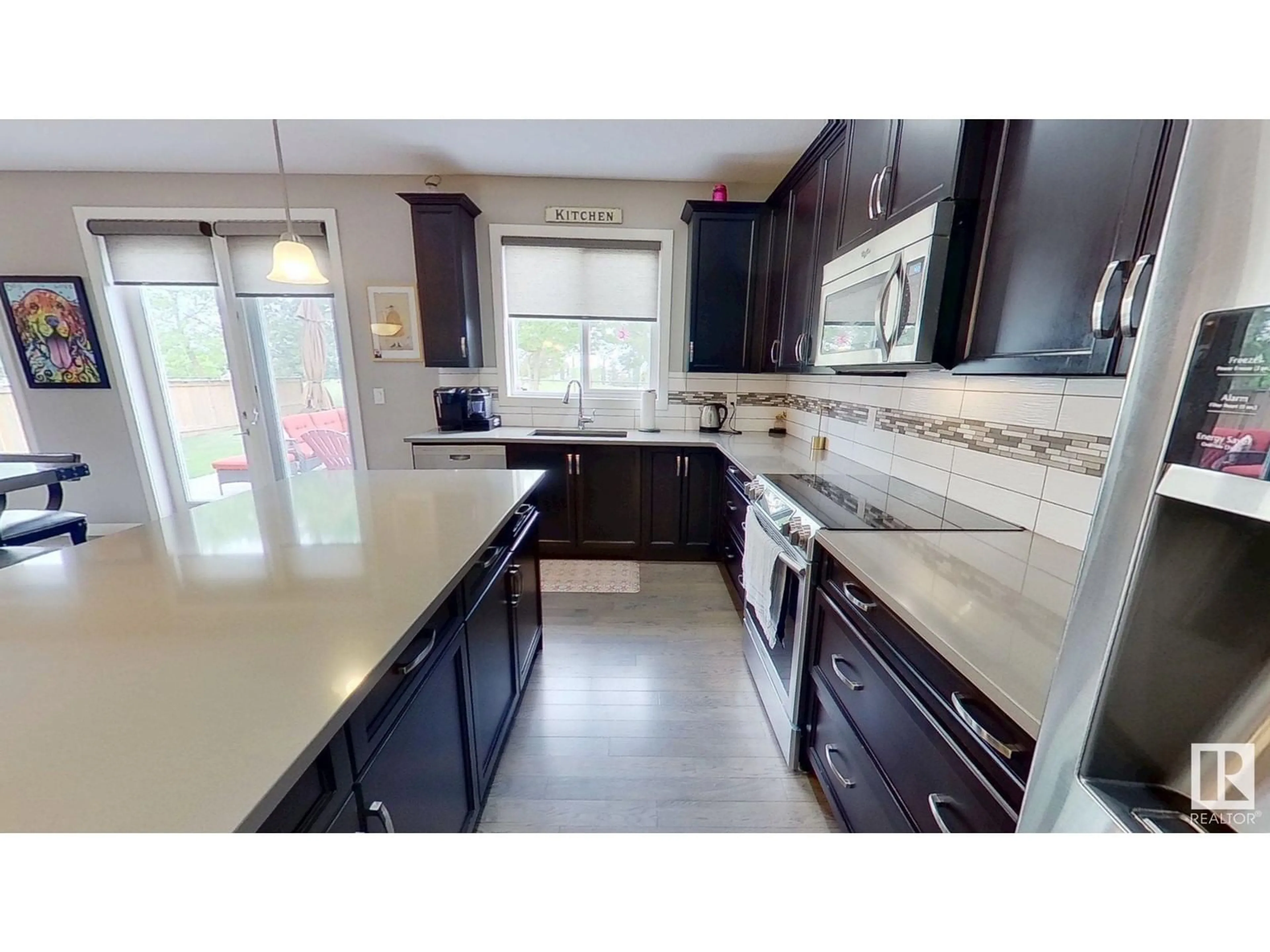 Open concept kitchen, ceramic/tile floor for 81 ROSEMOUNT BV, Beaumont Alberta T4X1Z5