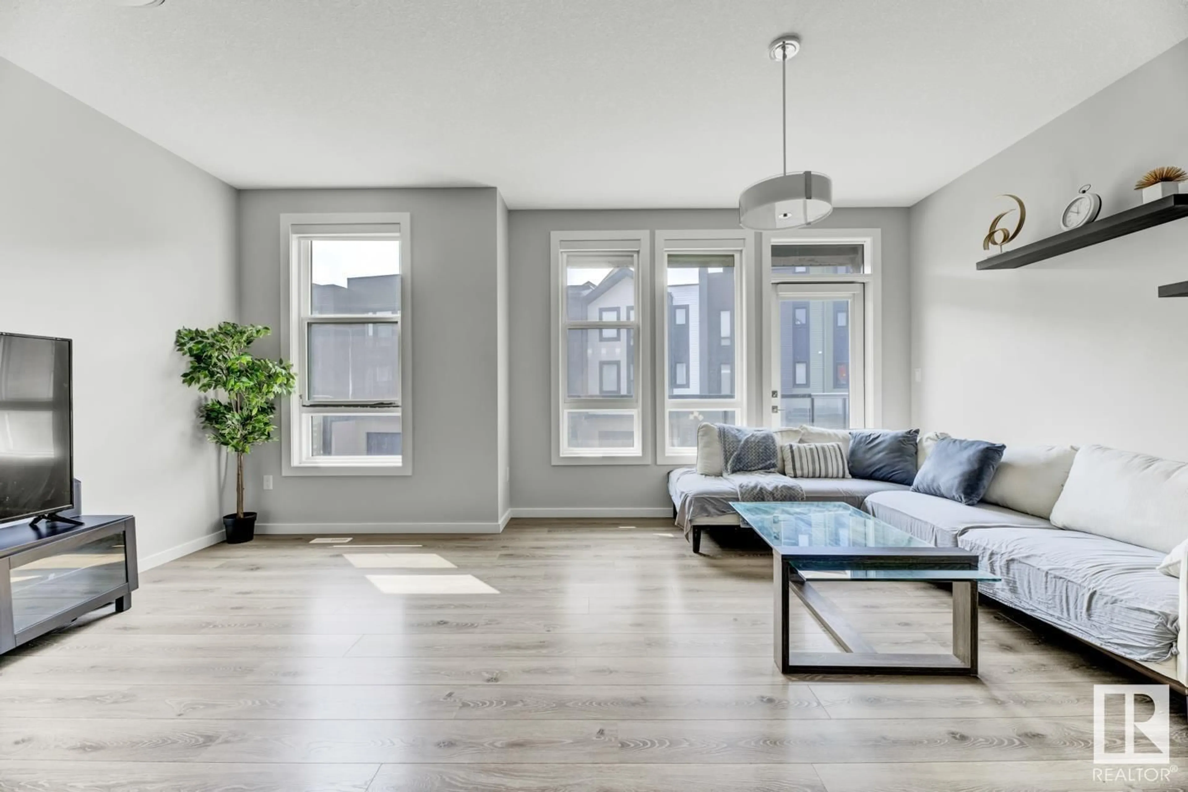 Living room with furniture, unknown for #114 - 1304 RUTHERFORD RD, Edmonton Alberta T6W0B4