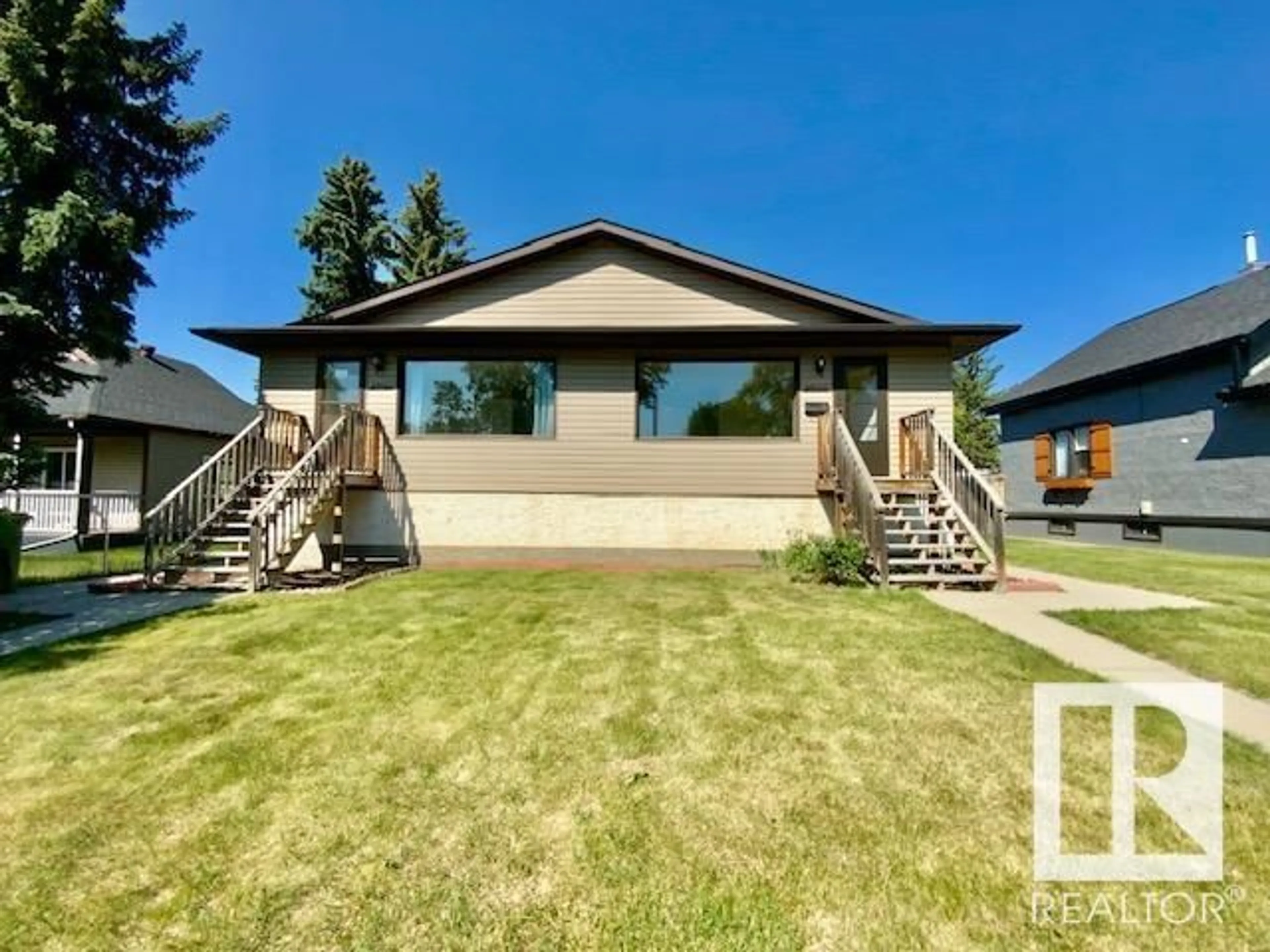 Home with vinyl exterior material, unknown for #A&B - 4310 52 ST, Wetaskiwin Alberta T9A1N4