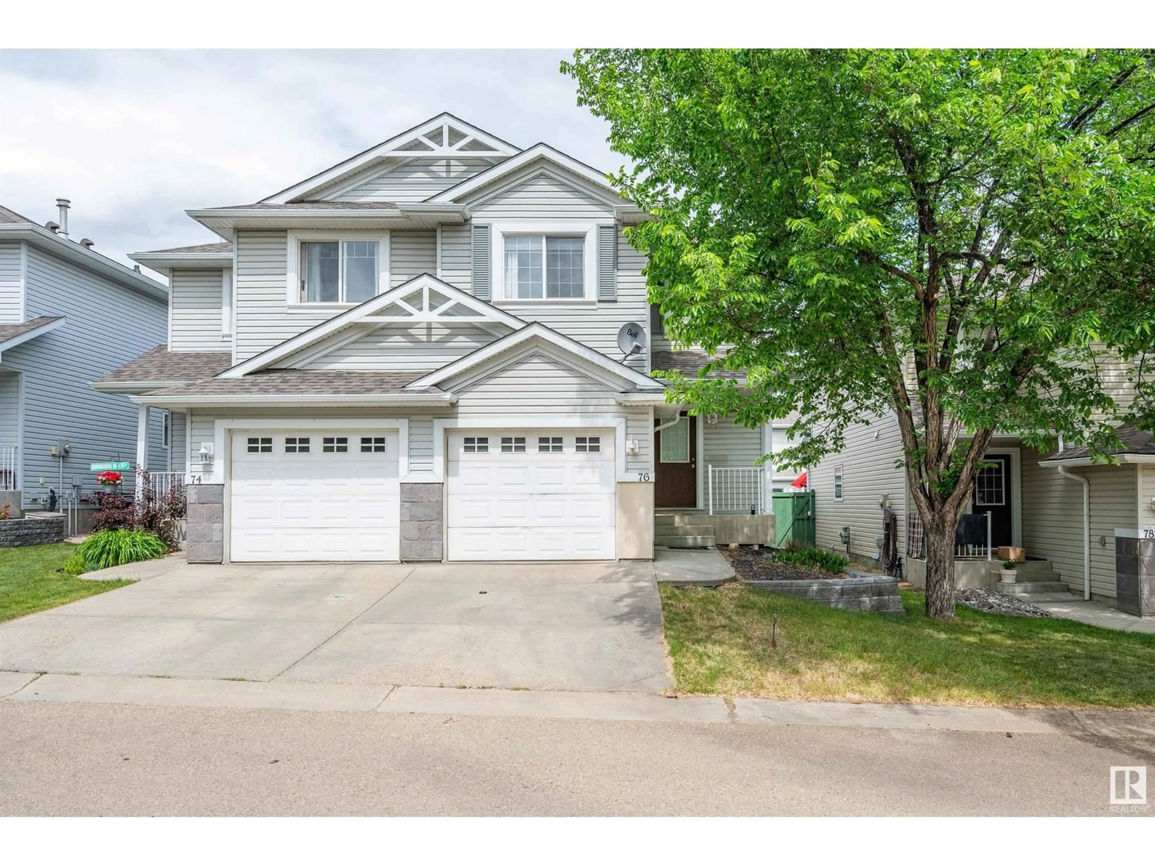 Home with vinyl exterior material, street for 76 115 CHESTERMERE DR, Sherwood Park Alberta T8H2W4