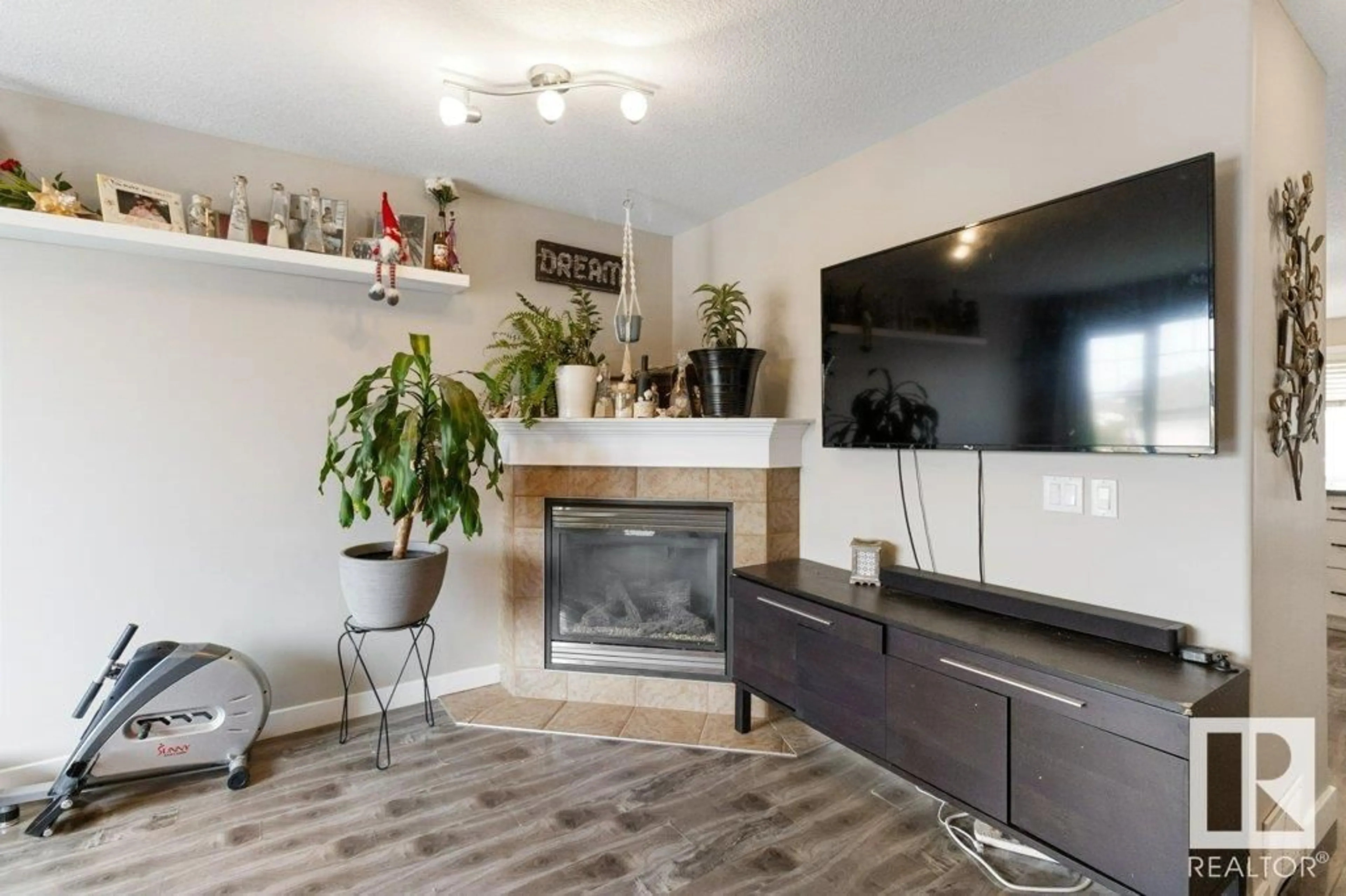 Living room with furniture, wood/laminate floor for 29 WALTERS CO, Leduc Alberta T9E0H9