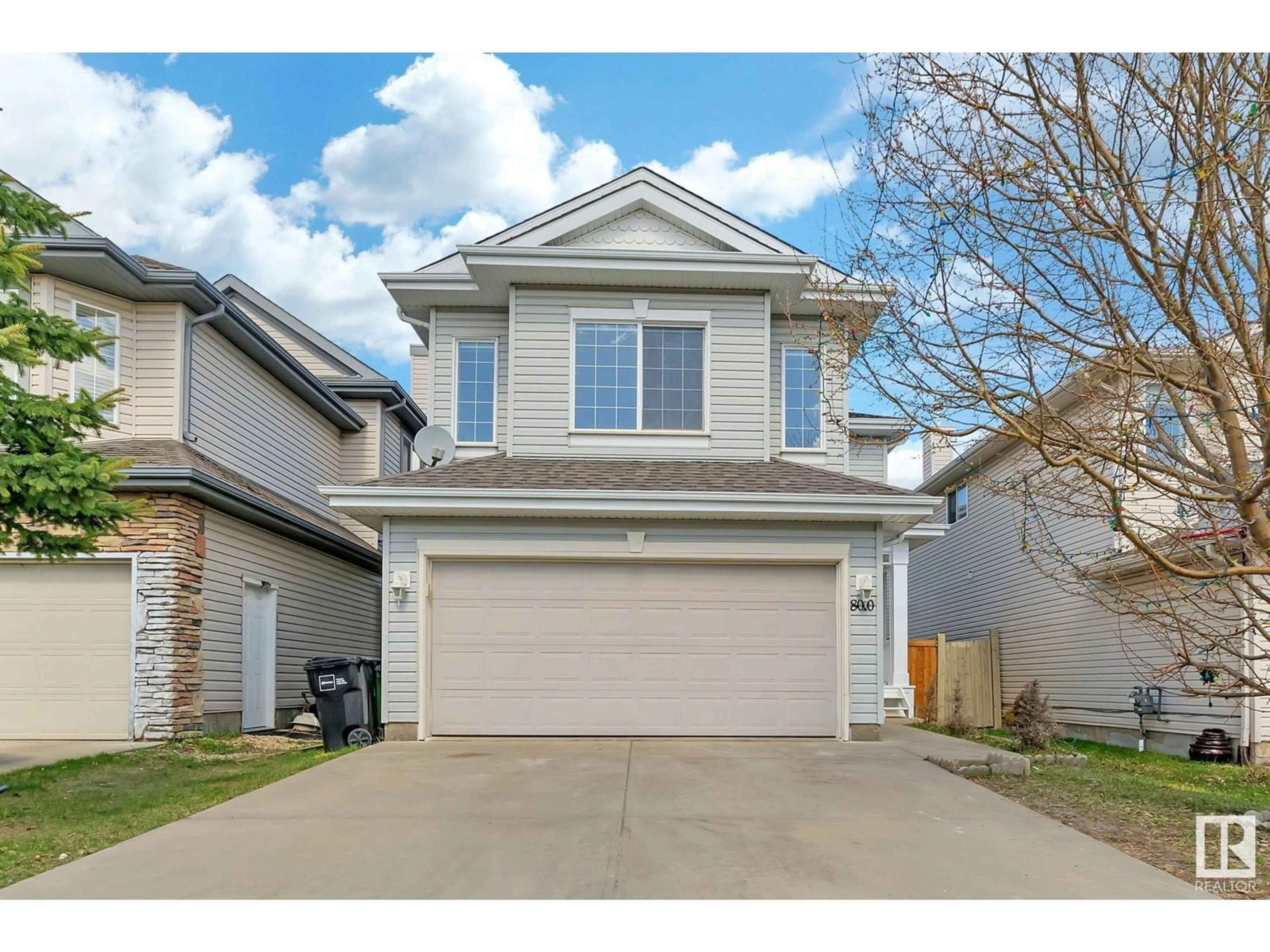 Home with vinyl exterior material, street for 8010 3 AV SW, Edmonton Alberta T6X1K6