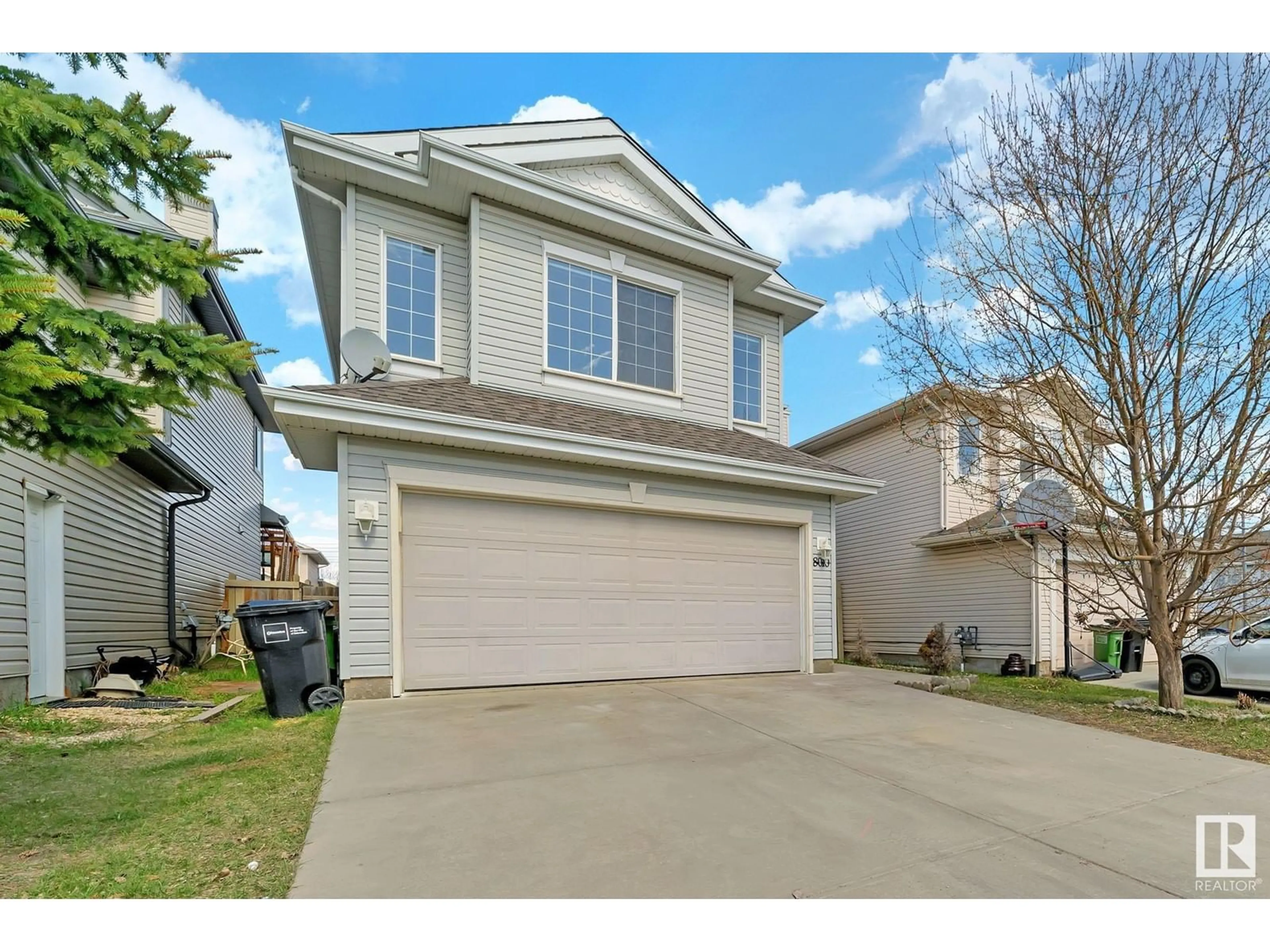 Home with vinyl exterior material, street for 8010 3 AV SW, Edmonton Alberta T6X1K6